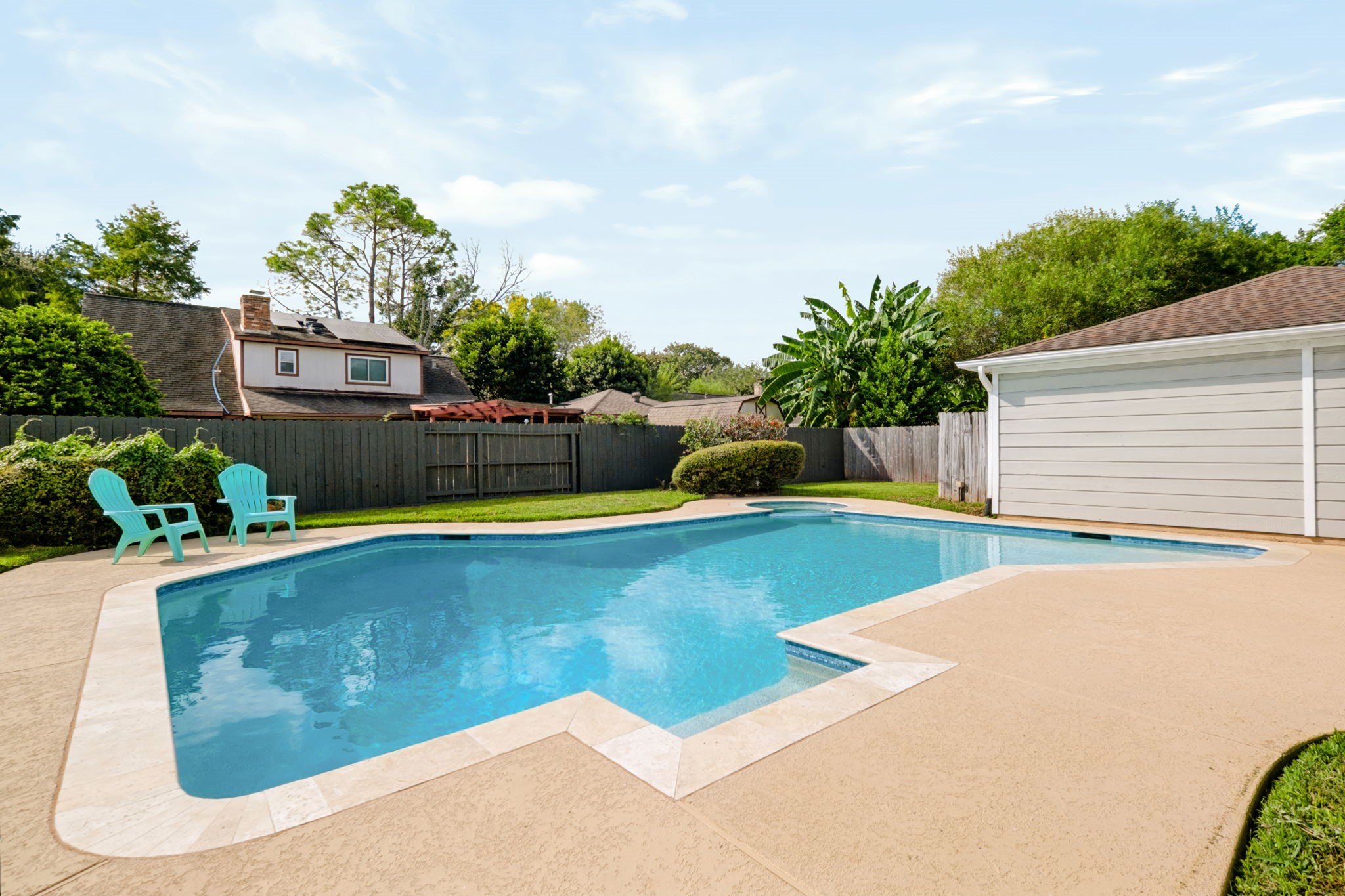 Recently redone pool with updated equipment and a spacious surrounding deck.