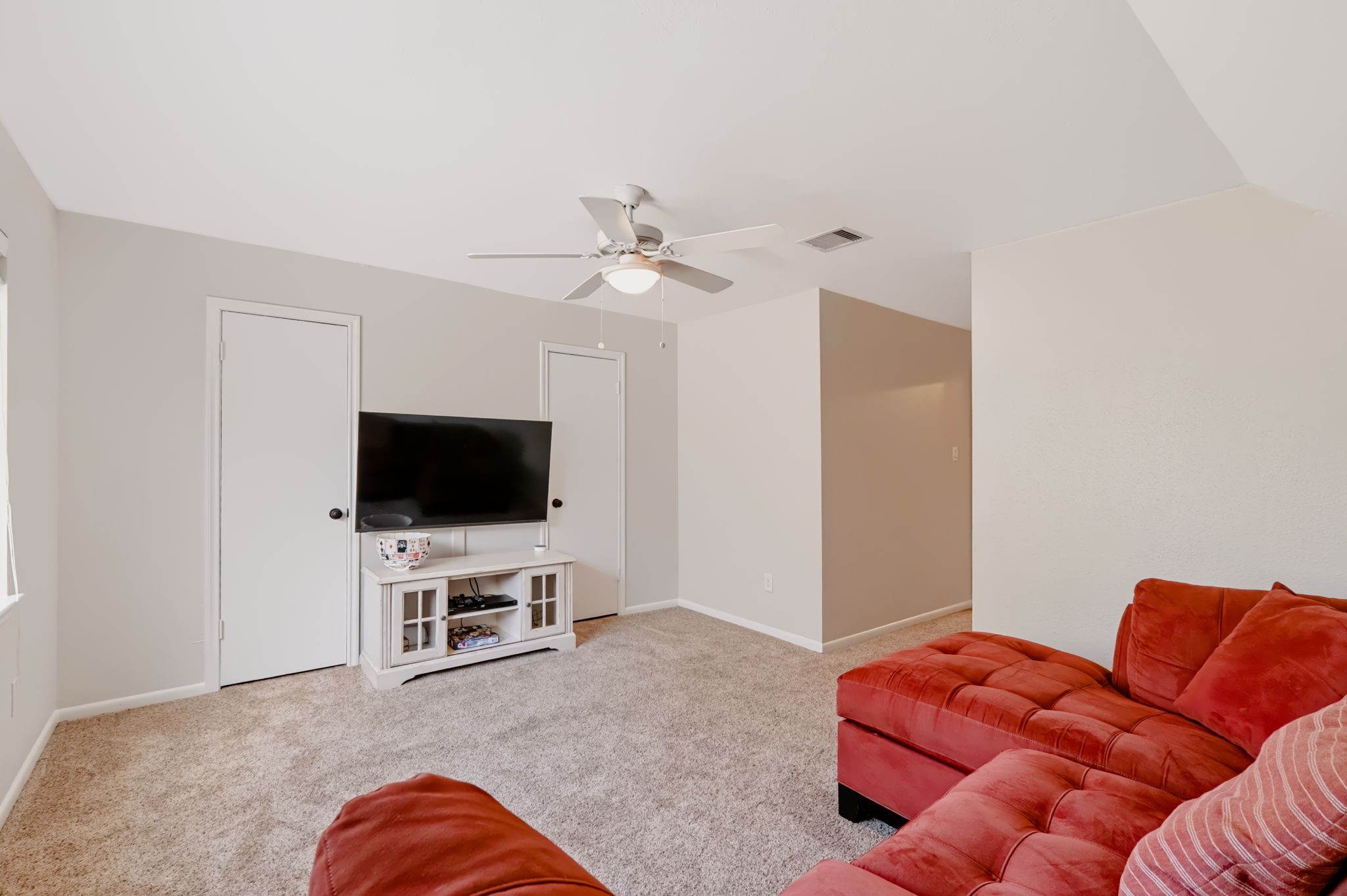 Versatile bonus room offering ample space for recreation or entertainment.