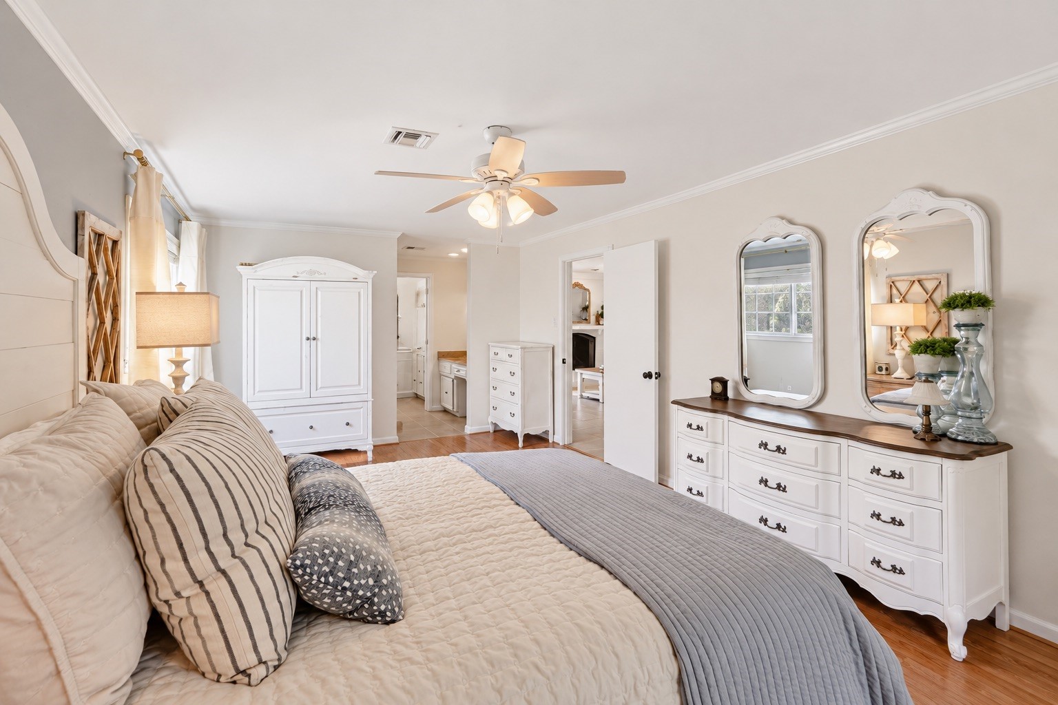 Spacious bedroom with abundant natural light.