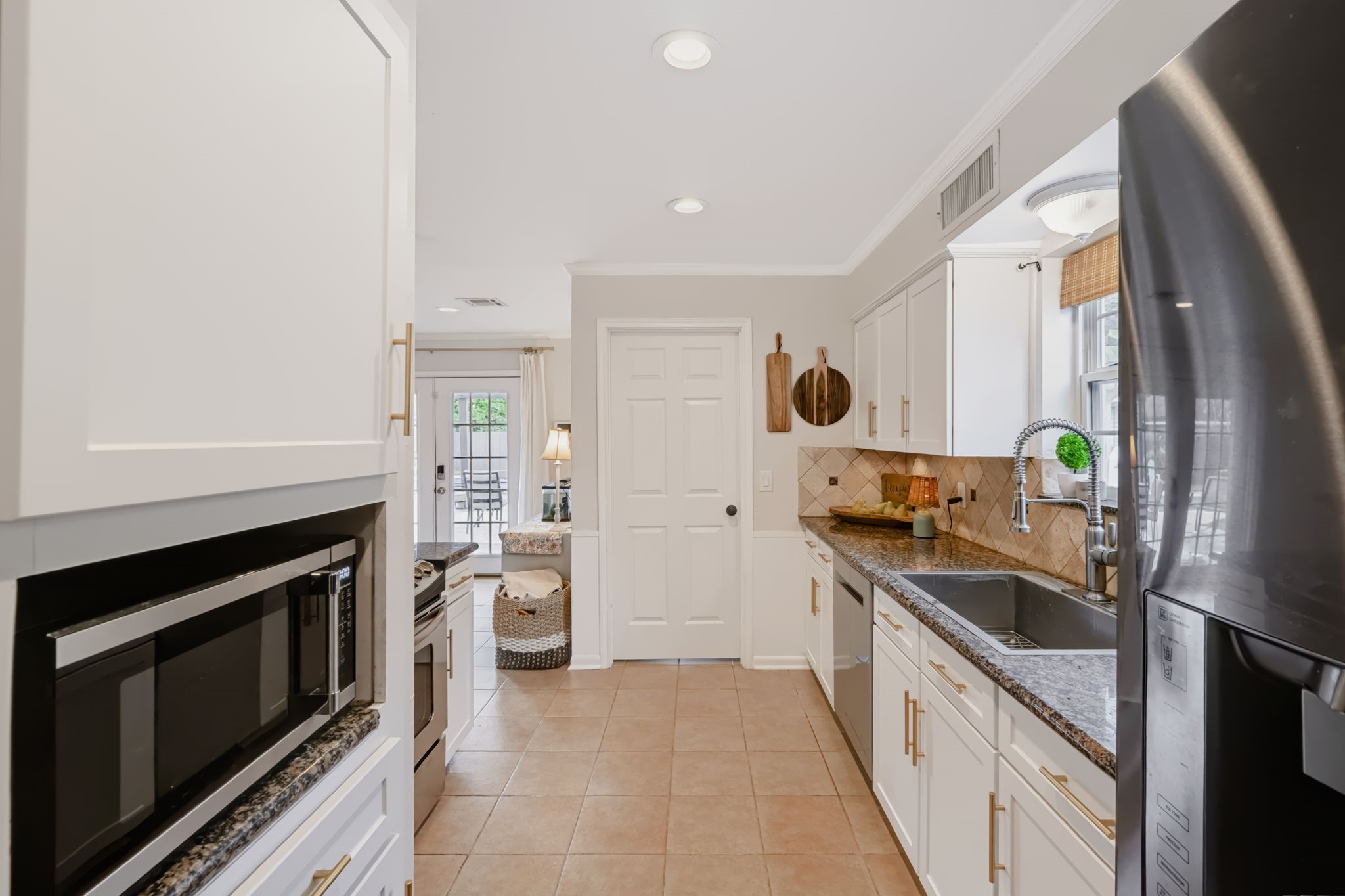 Galley-style kitchen with ample preparation and storage space.