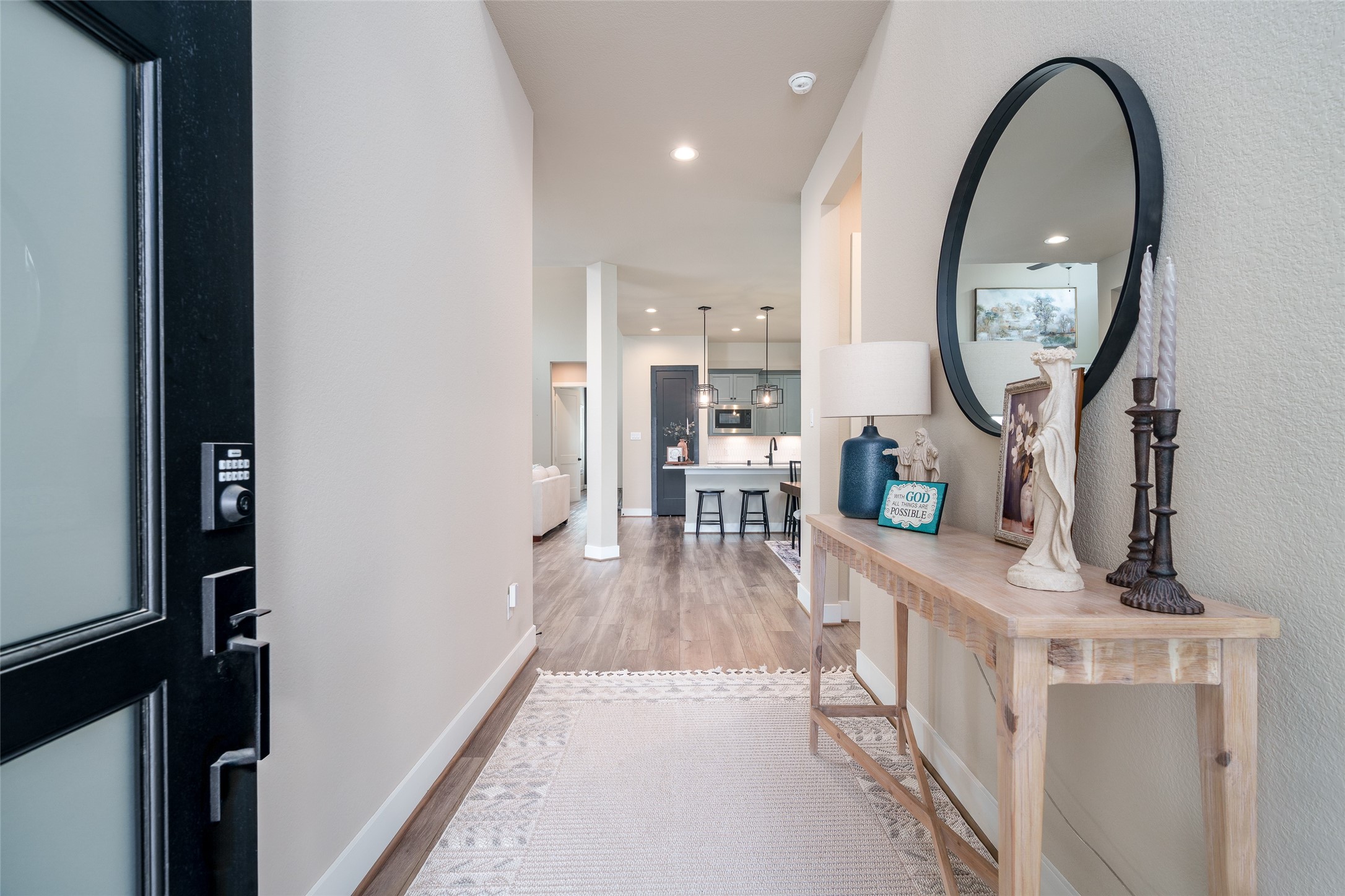 Welcome in! You're greeted with high ceilings and an 8' Mahogany door.