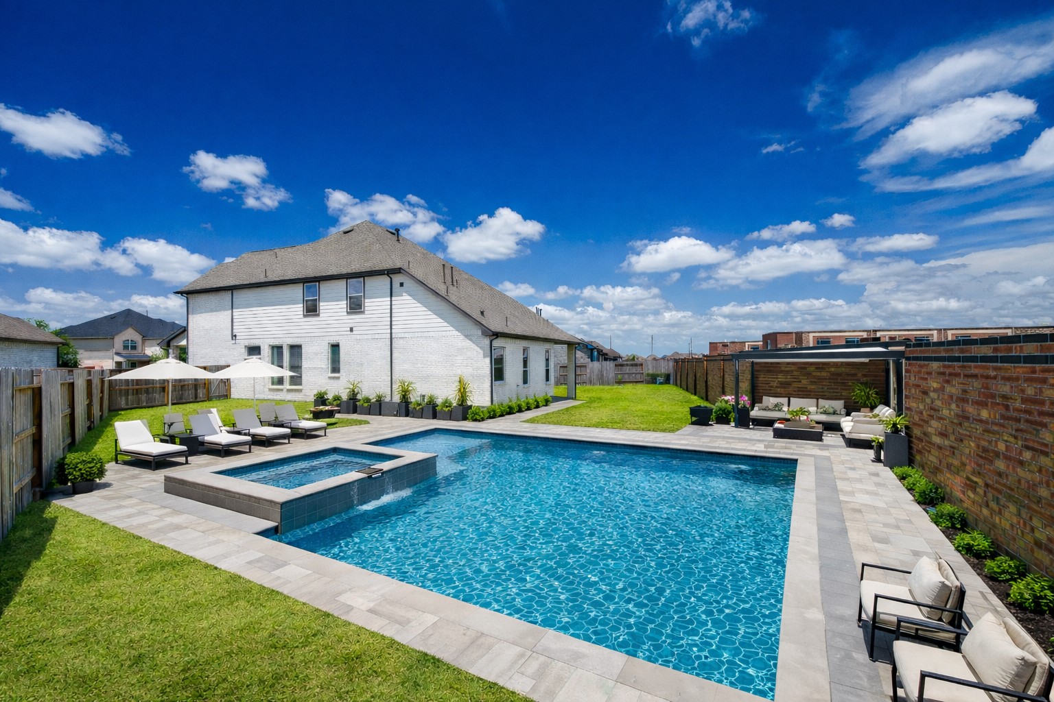 An oversized backyard with room to dream big! Design your own custom pool, create the perfect hangout spot, and make this space the heart of unforgettable moments with friends and family. *Home does not include a pool. This is a virtual rendering of a potential pool layout with furniture*