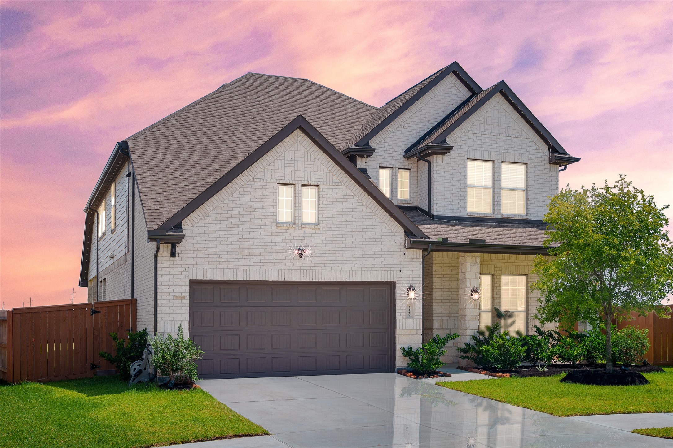 Enjoy outdoor living on the front patio, beautifully complemented by an upgraded stone/brick elevation, full gutters, plush landscaping, and a well maintained front lawn.