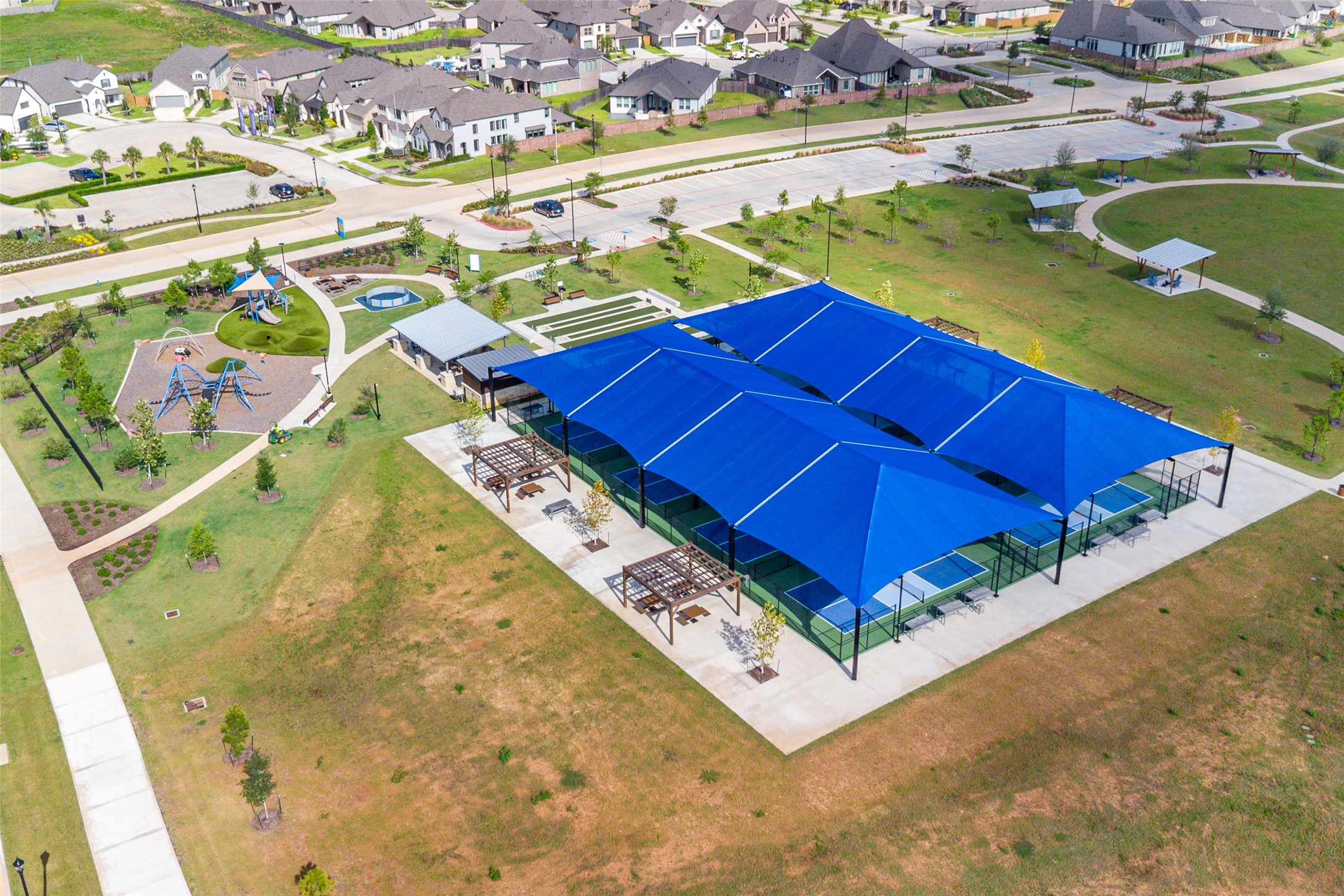 Escape to resort-style living right at home in Sunterra, Katy! From the sparkling Crystal Lagoon and lazy river to pickleball courts, dog parks, and miles of scenic trails, theres something for everyone to enjoy. Sun, sand, and endless fun, all just steps from your front door!
