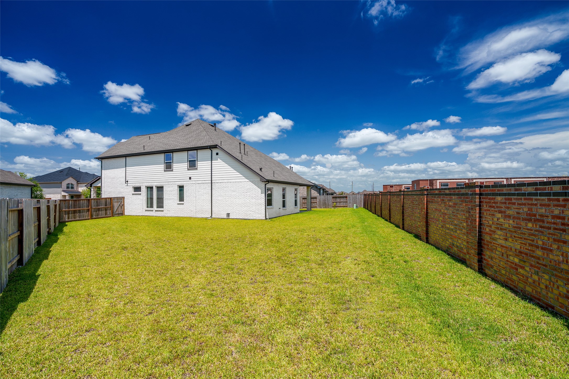 This spacious backyard has plenty of space to build your custom pool/spa or even a basketball court, batting cage and more!