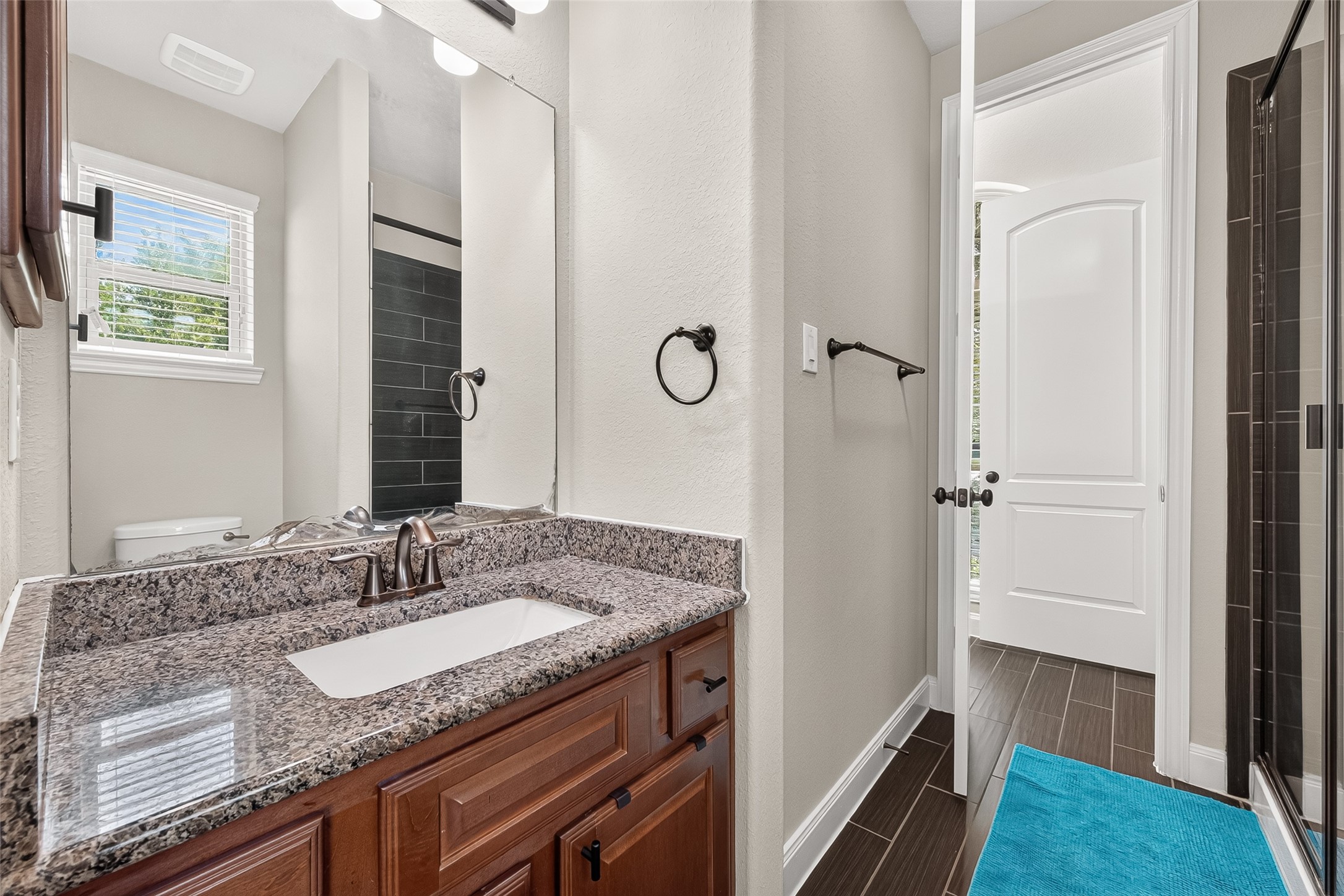 Full Bathroom with standing shower.