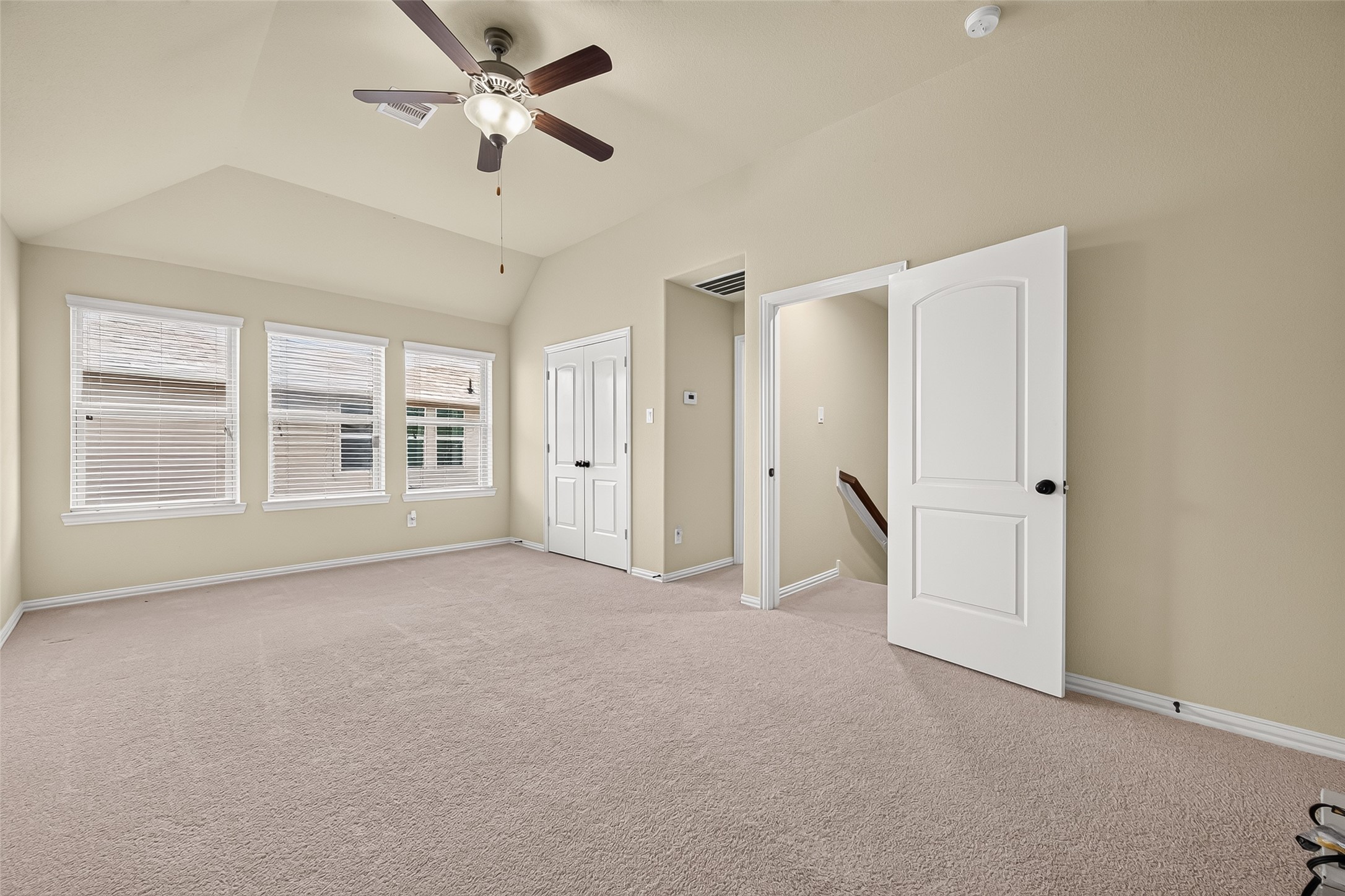 Upstairs Bedroom with Ensuite: Upstairs, you'll find a private bedroom and full bath, making it an ideal retreat for guests, a game room alternative, or home office.