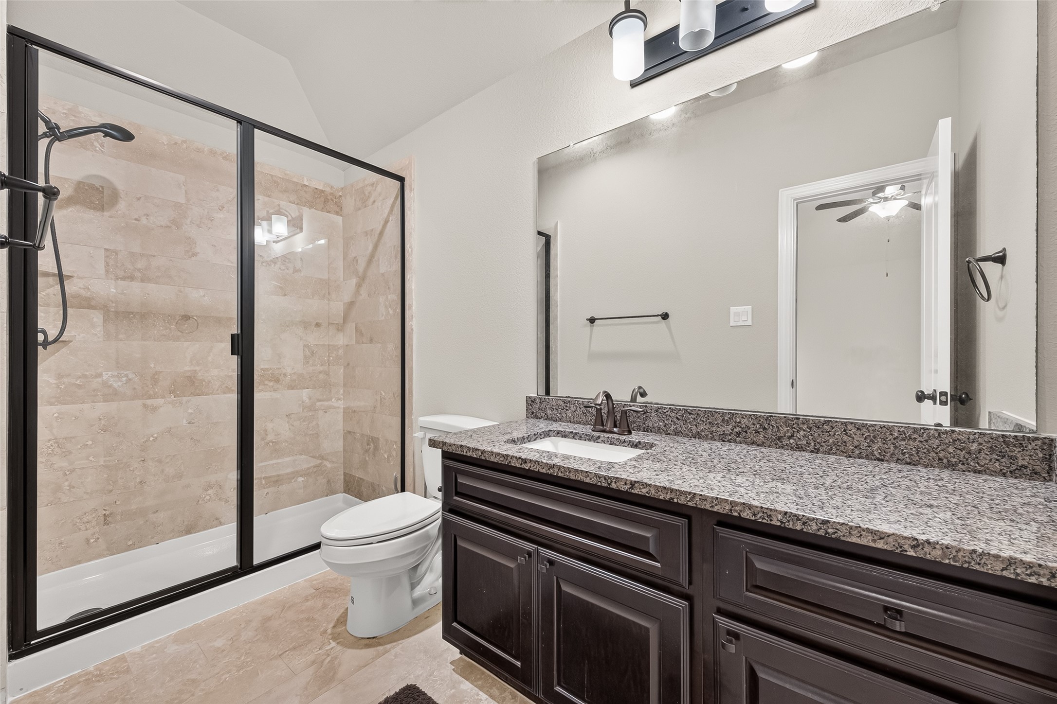 Upstairs ensuite with standing shower.