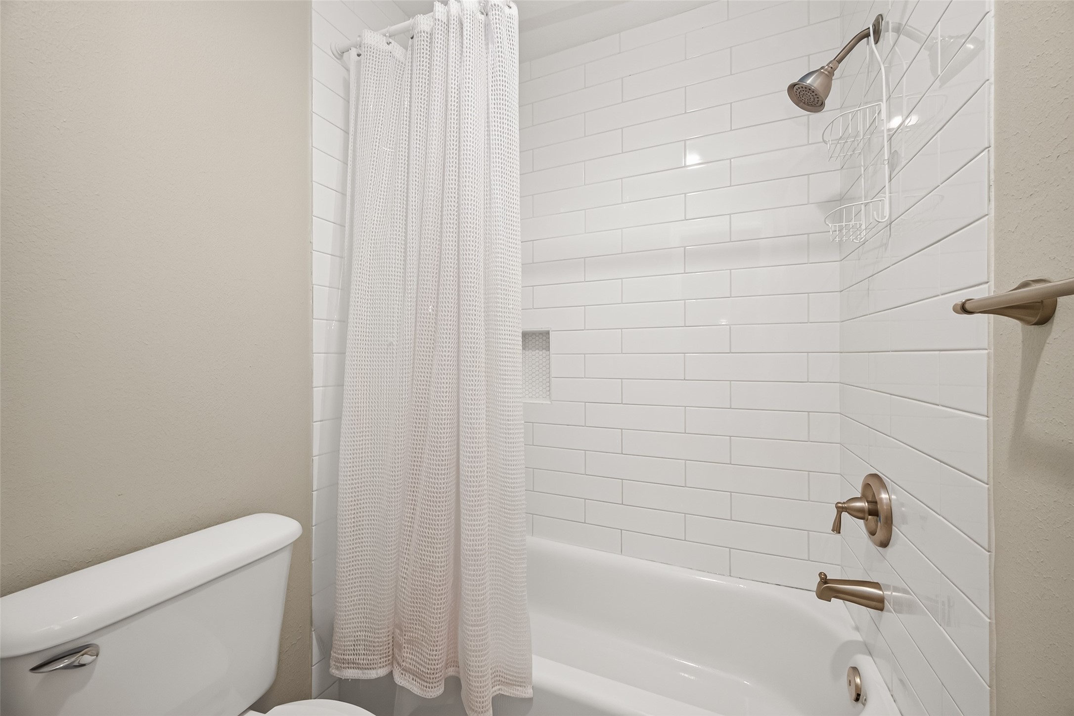 Jack and Jill bathroom has a separate tub/shower and toilet.