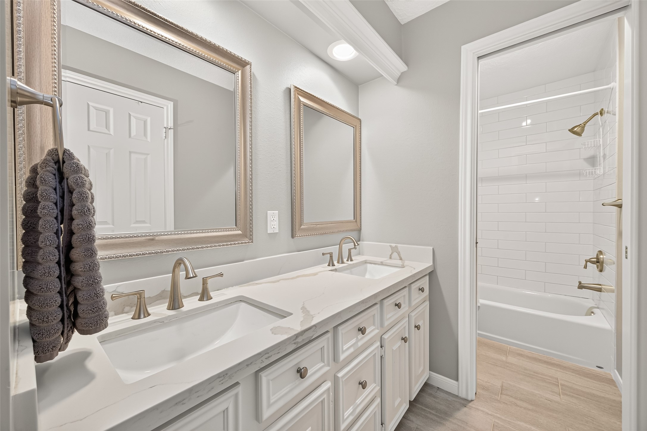 Jack and Jill bathroom has double sinks.