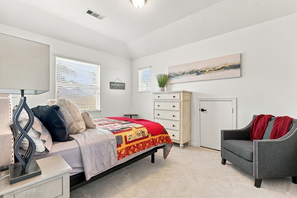 Bedroom 2- Upstairs w/ walk-in closet and attic access door.