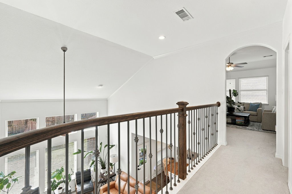 Balcony overlooking living room leading to Game/Flex room.