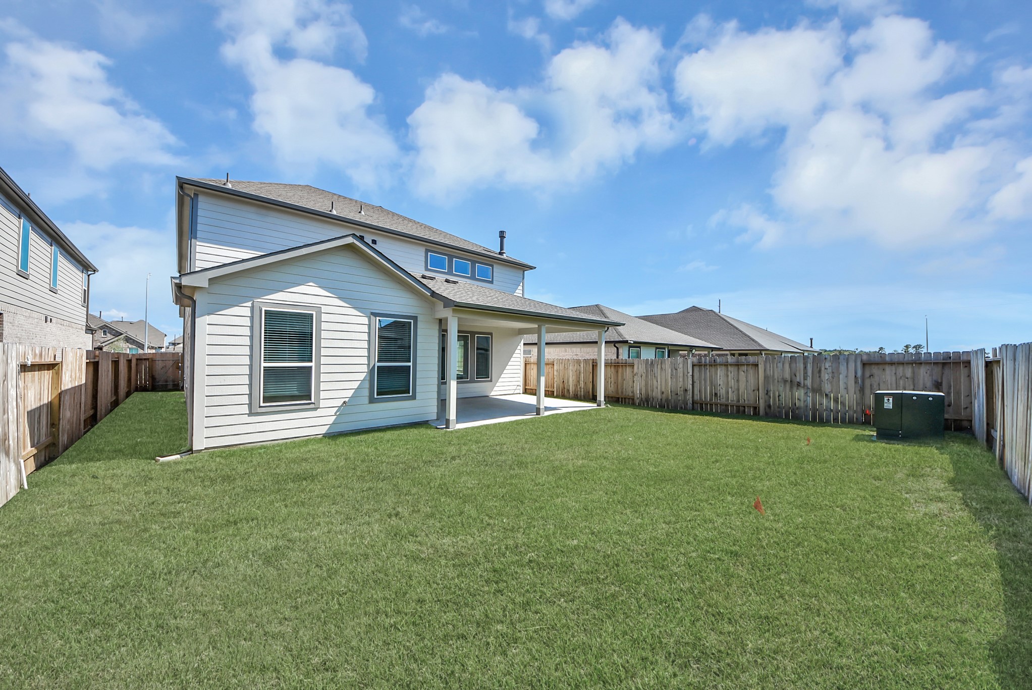 Come and see this spacious backyard with its beautiful covered patio. There is plenty of room for the kids to play and adults to relax. Perfect for your outdoor living space, patio furniture, bbq pit, and so much more. The possibilities are endless!