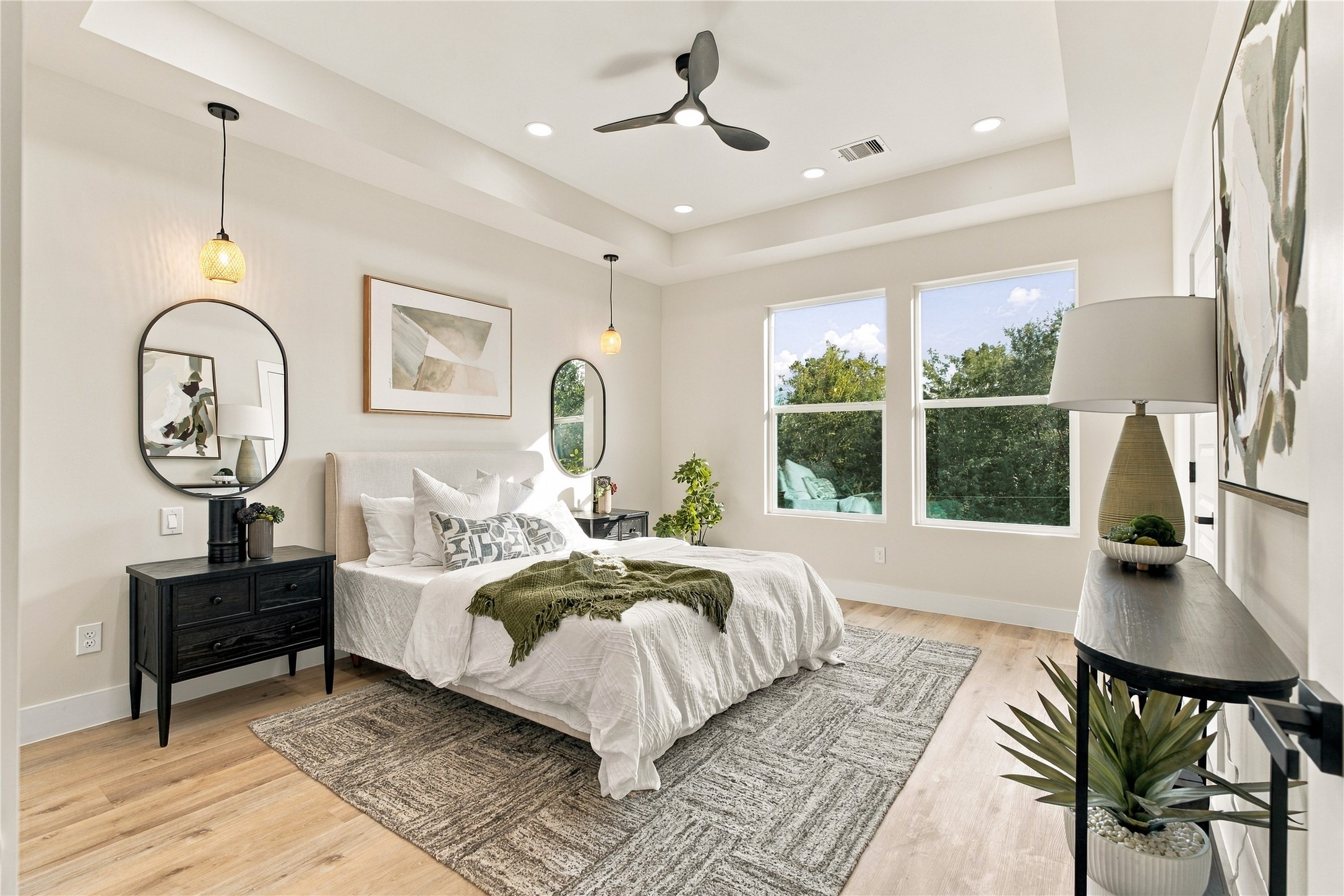 Restful primary sanctuary  peaceful bedroom retreat bathed in light, designed for pure relaxation and sleep.