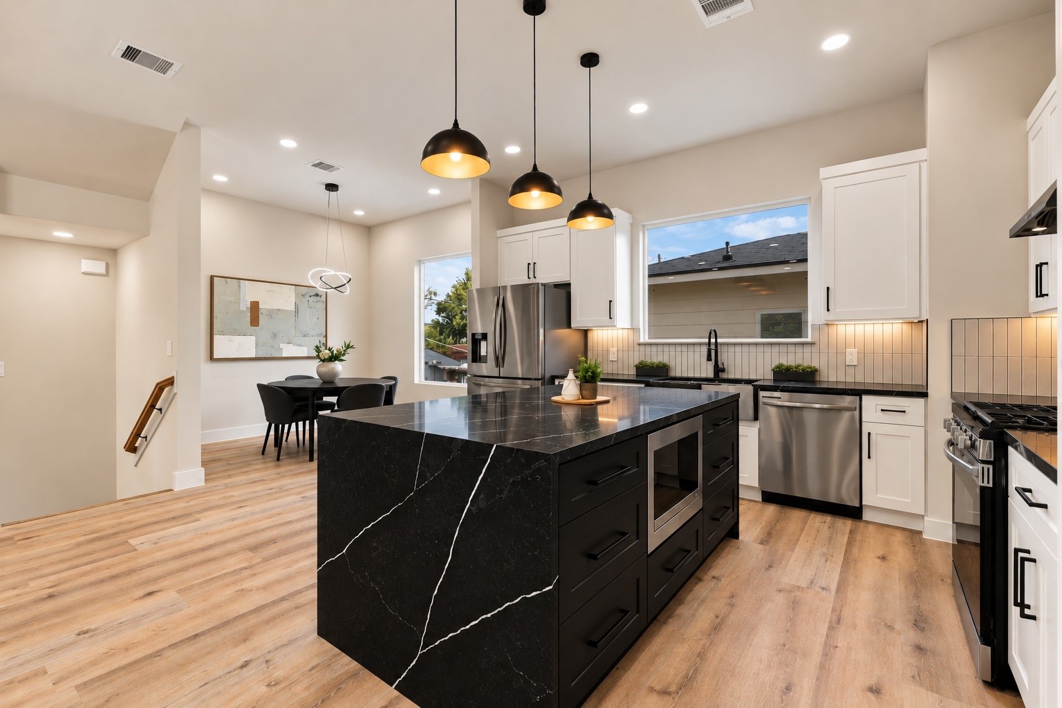 Modern kitchen luxury  functional island with built-in storage drawers keeps your culinary tools right at hand.
