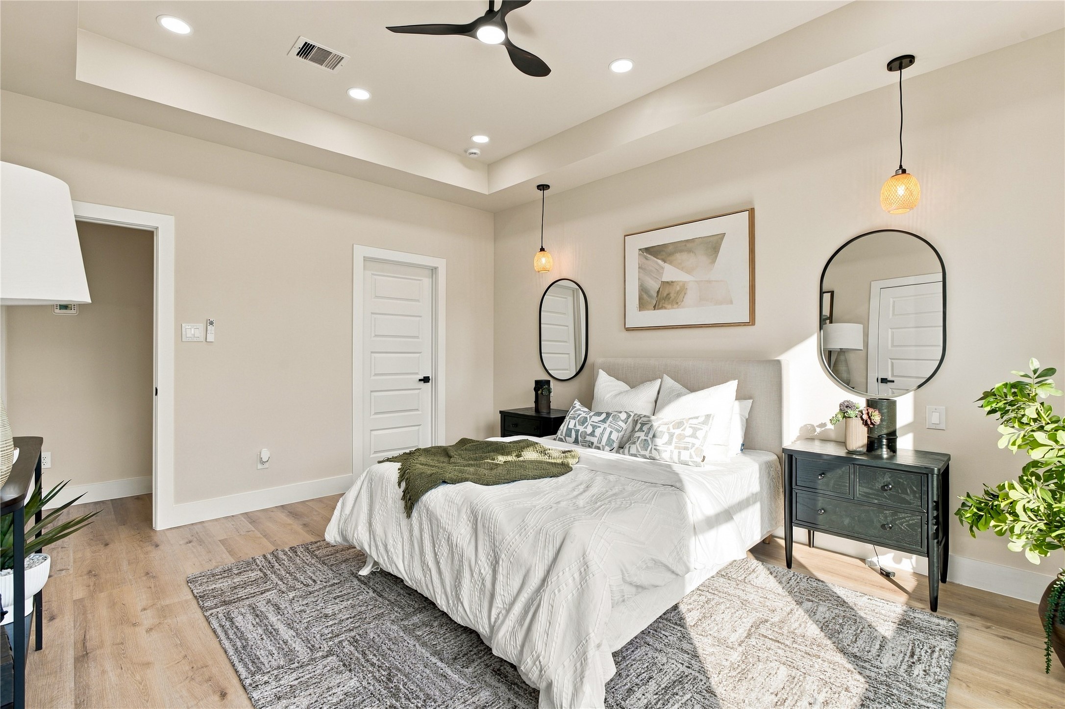 Bright secondary bedroom  airy room layout ideal for family members, an office, or creative studio space.