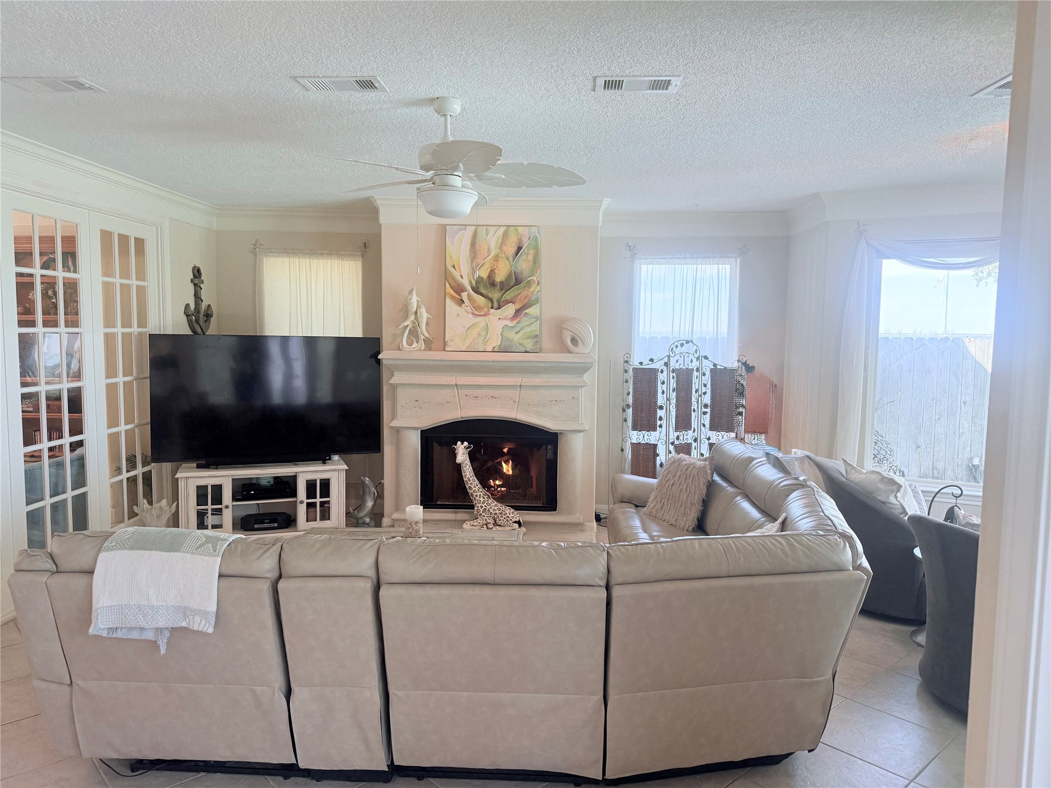 Another view of the living room with the gas fireplace.