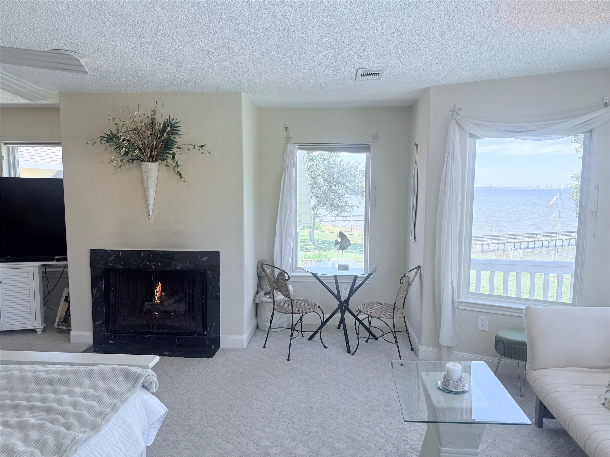 Windows all around the Primary Suite. Fireplace for those cosy nights.