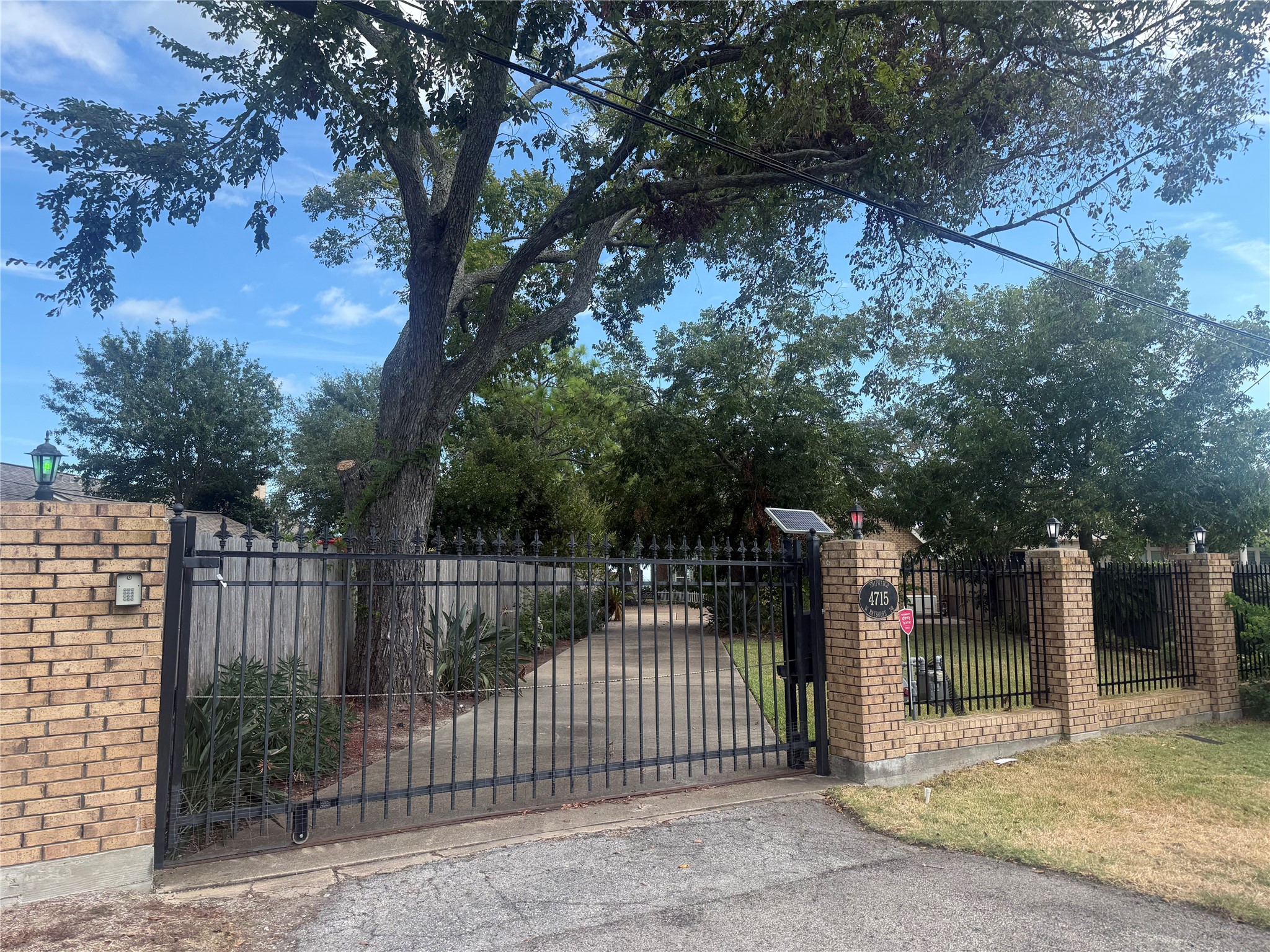 Private gate with keypad at entrance.
