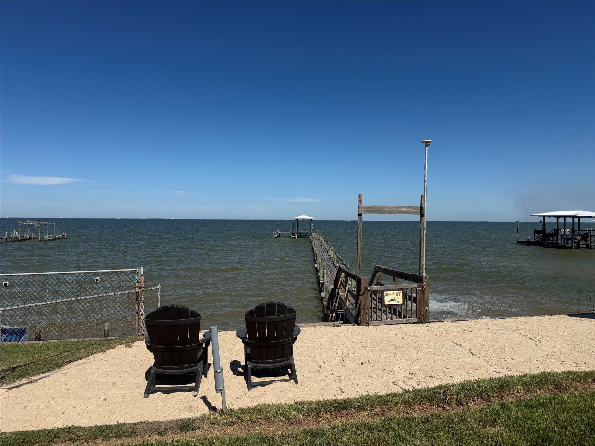 Come try out the deck chairs on the private beach.