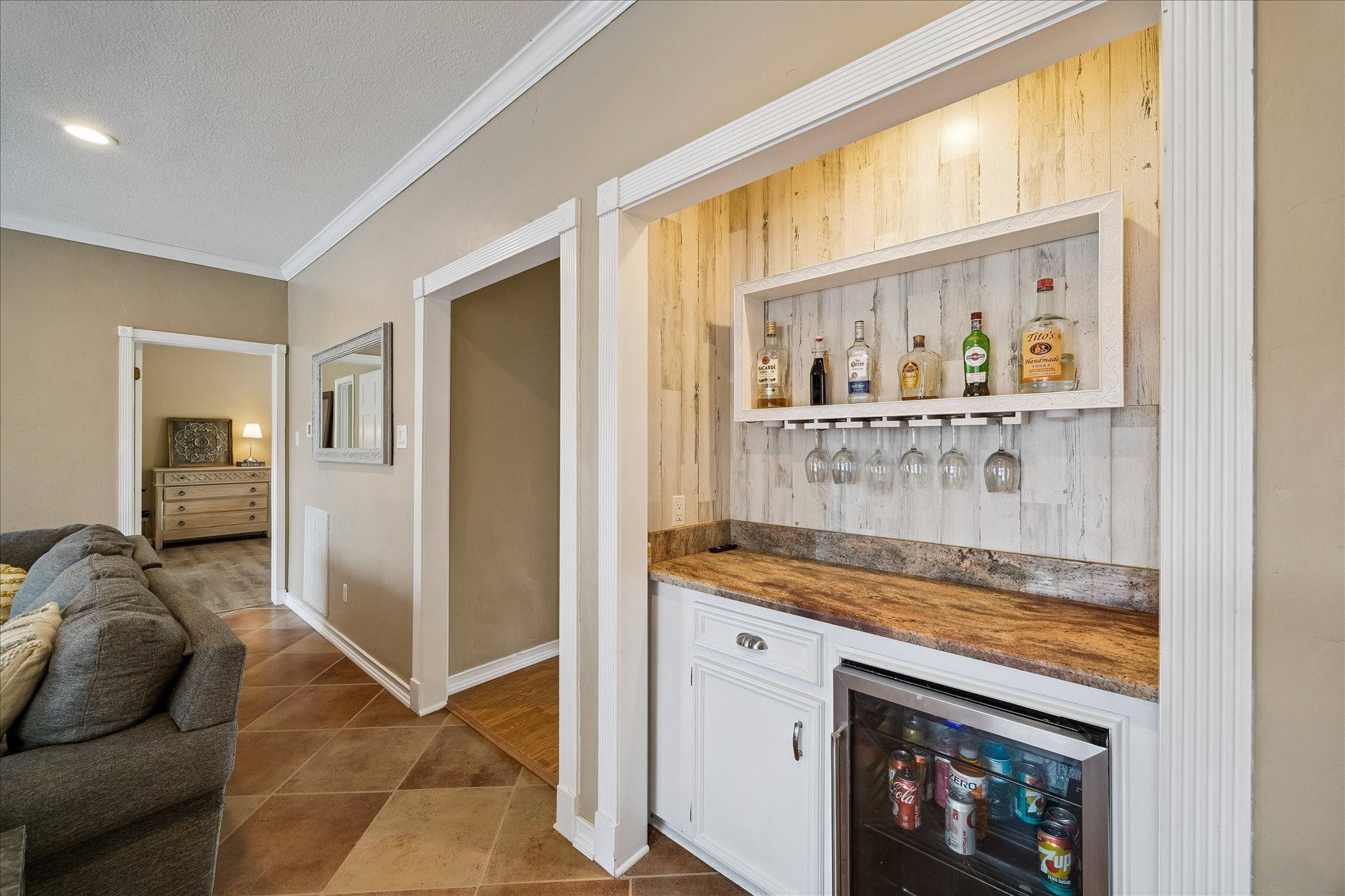 Great entertaining nook here complete with a fridge.