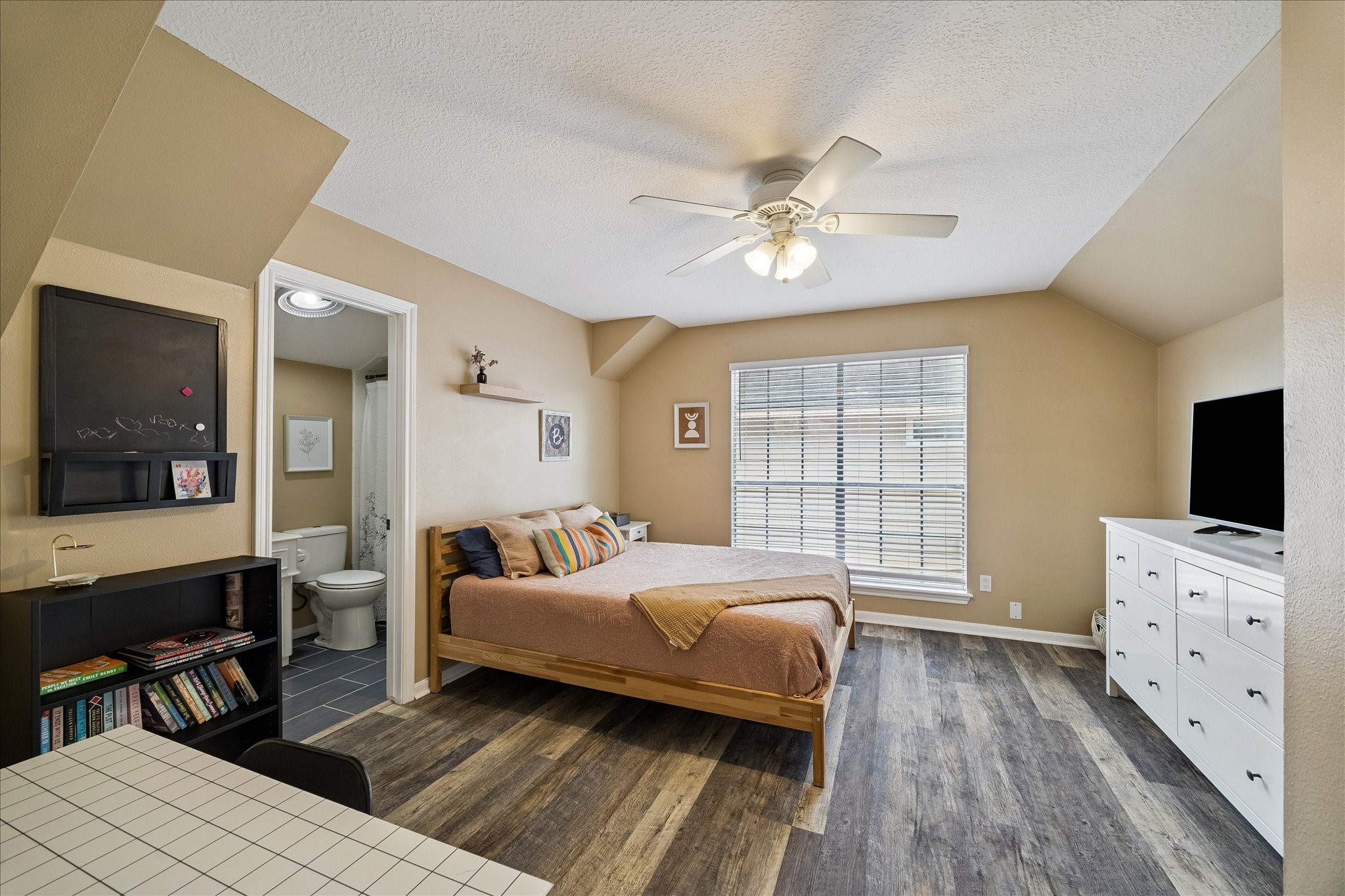 One of the secondary bedrooms with an ensuite bath.