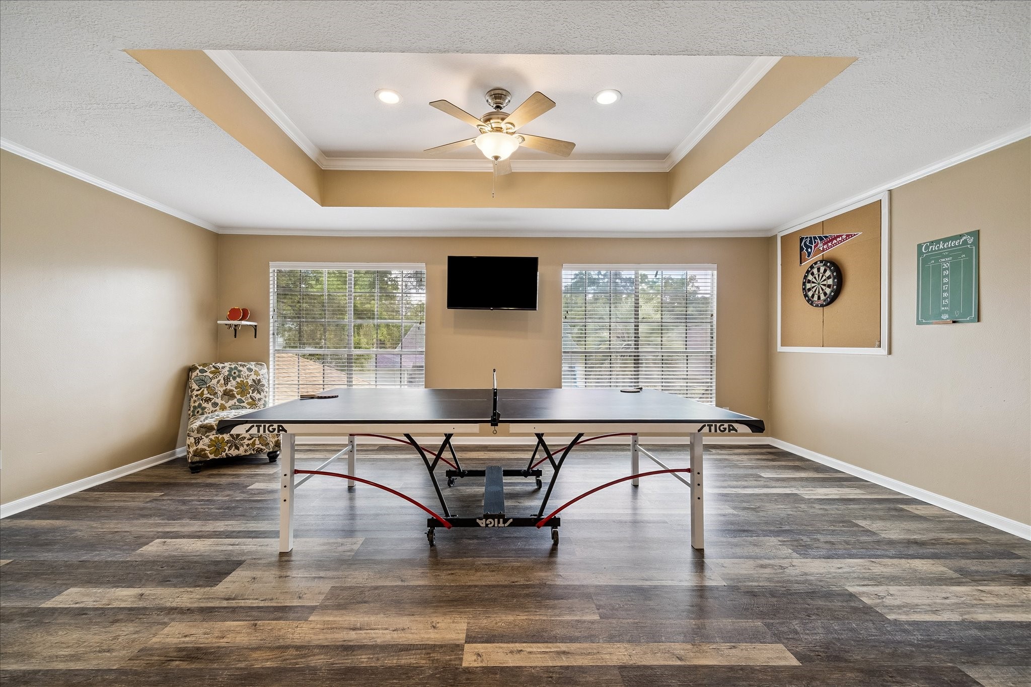 Upstairs you will find a very large game room with tray ceilings.