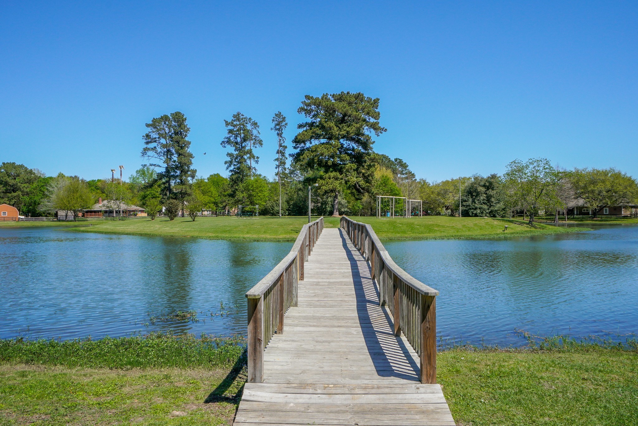 Beautiful Neighborhood Lake with Island. Enjoy Watching the Kids Play on the Swings and Playground Equipment and have a Picnic at the Picnic Tables. Catch and Release Fishing. Don't Forget to Feed the Ducks!