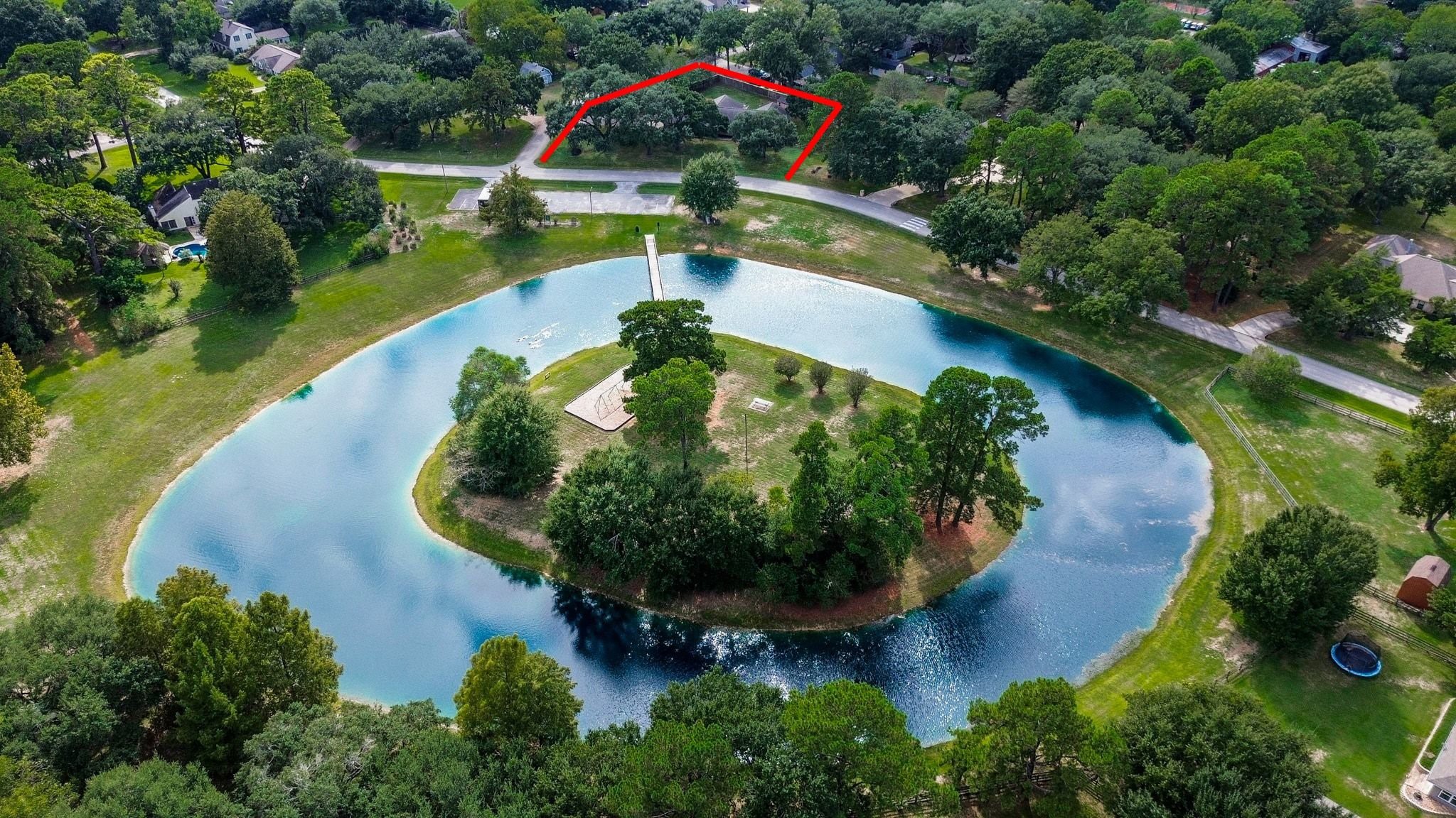 Aerial View of the Home which is Across the Street from the Beautiful Neighborhood Lake with Island. Enjoy Watching the Kids Play on the Swings and Playground Equipment and have a Picnic at the Picnic Tables. Catch and Release Fishing. Don't Forget to Feed the Ducks! Aerial View of the Home which is Across the Street from the Beautiful Neighborhood Lake with Island. Enjoy Watching the Kids Play on the Swings and Playground Equipment and have a Picnic at the Picnic Tables. Catch and Release Fishing. Don't Forget to Feed the Ducks!