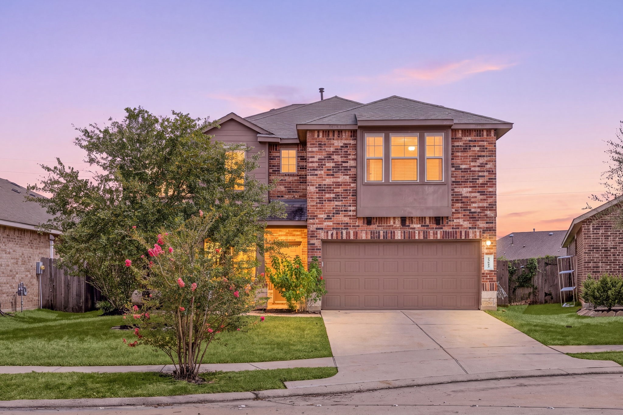Welcome home to 23643 Balzano Court, nestled on a peaceful cul-de-sac in Ventana Lakes and zoned to Katy ISD! Beautiful stone and brick elevation, manicured landscaping, a welcoming covered front porch, elegant outdoor lighting, and a spacious double-wide driveway create exceptional curb appeal from the moment you arrive.