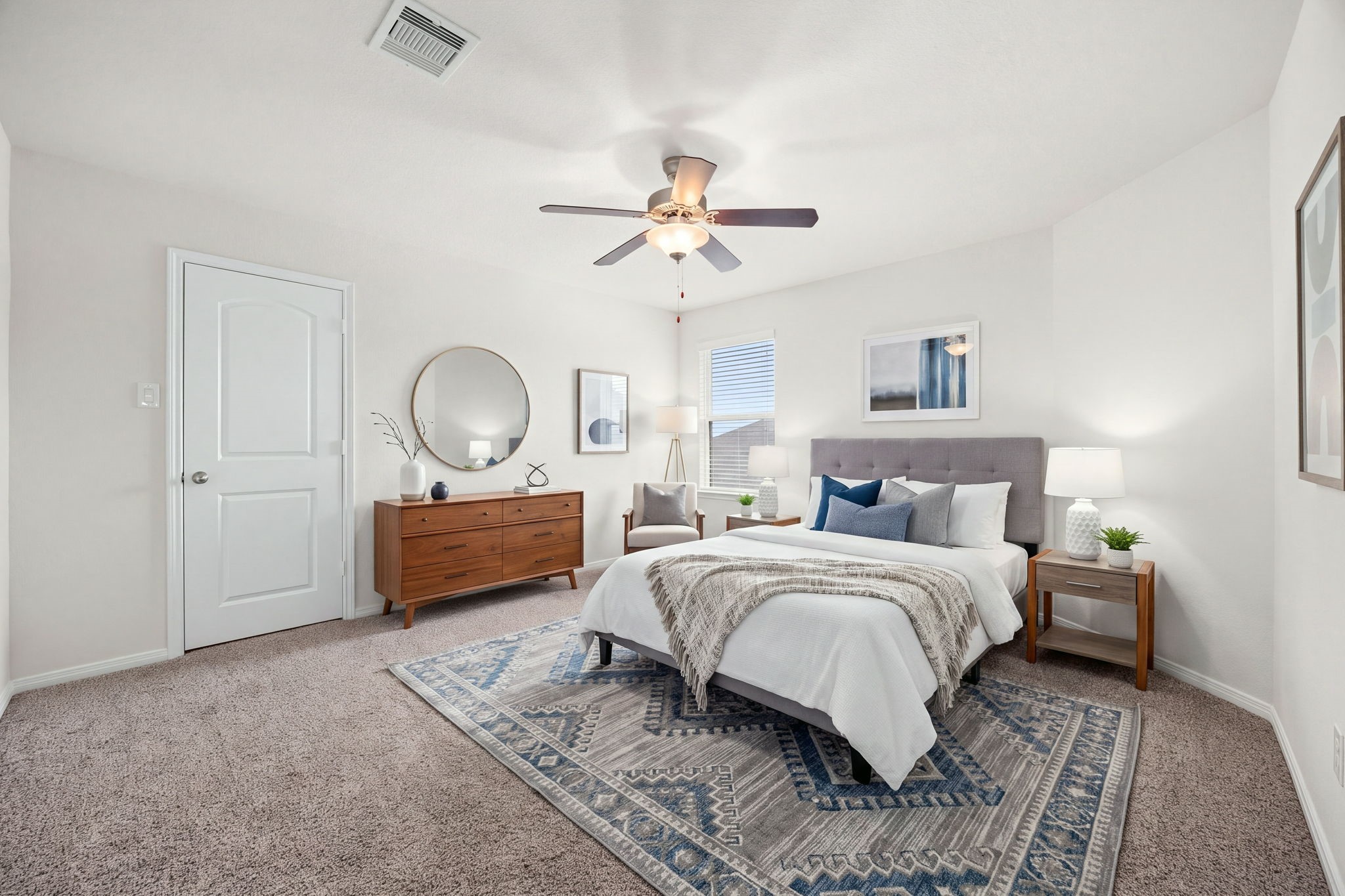 Inviting secondary bedroom showcasing a comfortable layout, plush wall-to-wall carpeting, and a bright single window.