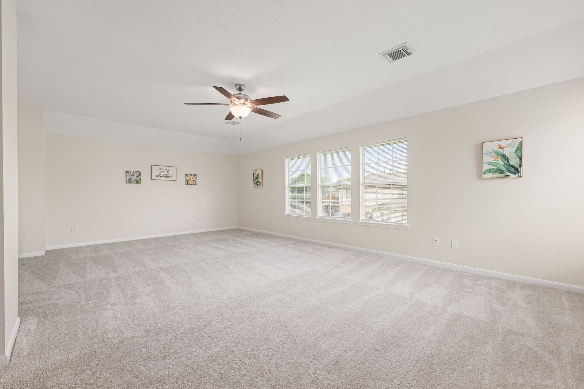 Upstairs game room provides the perfect space for entertainment or family gatherings.