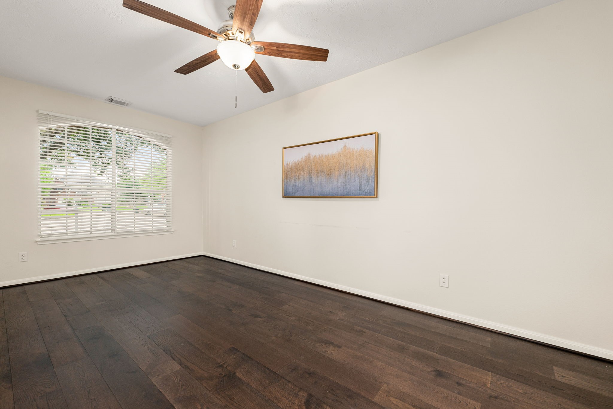 Versatile flex space perfect for a play area, reading nook, or additional sitting space.