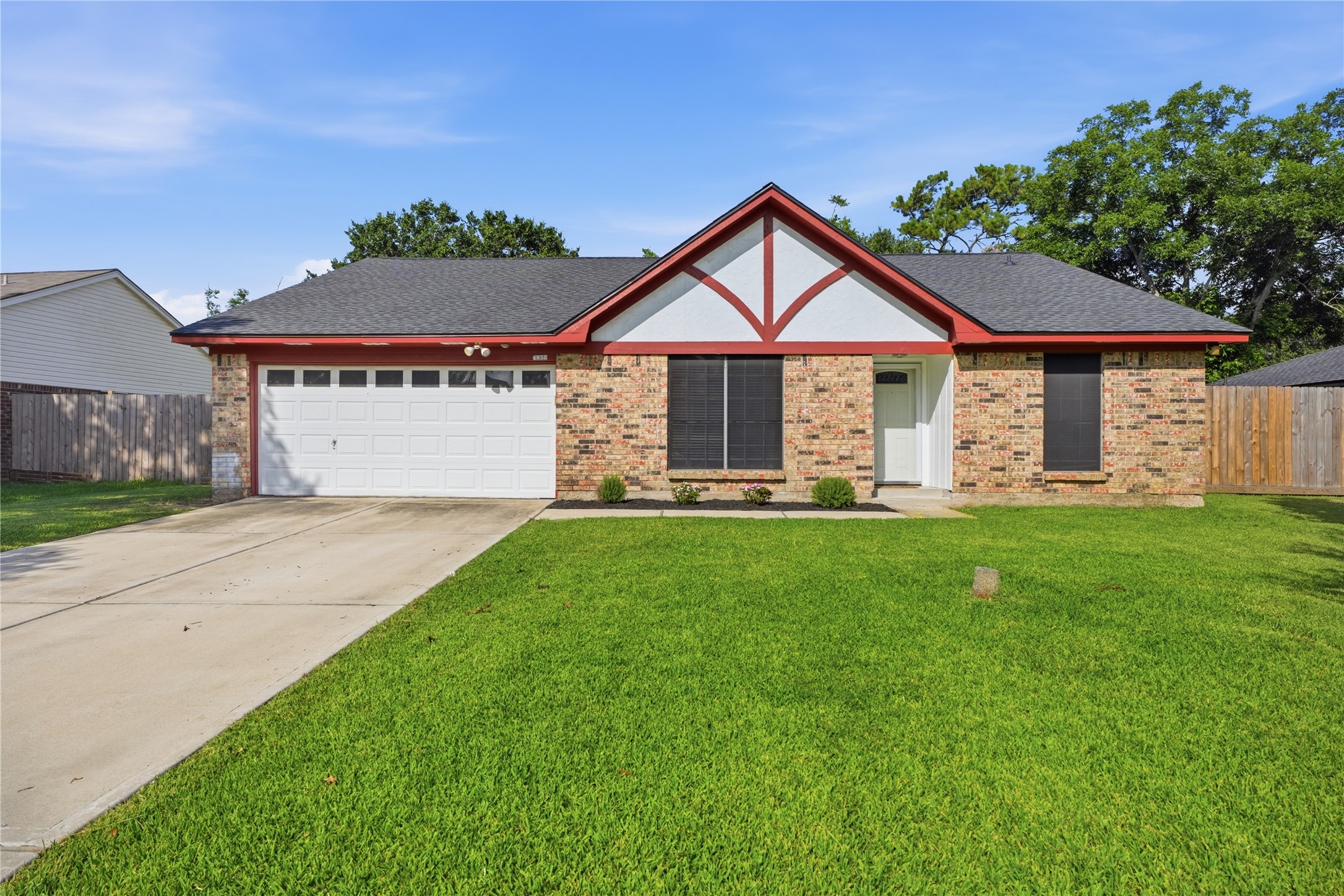 Inviting front entrance featuring attractive architectural details, fresh landscaping, and a welcoming covered entry. Inviting front entrance featuring attractive architectural details, fresh landscaping, and a welcoming covered entry.