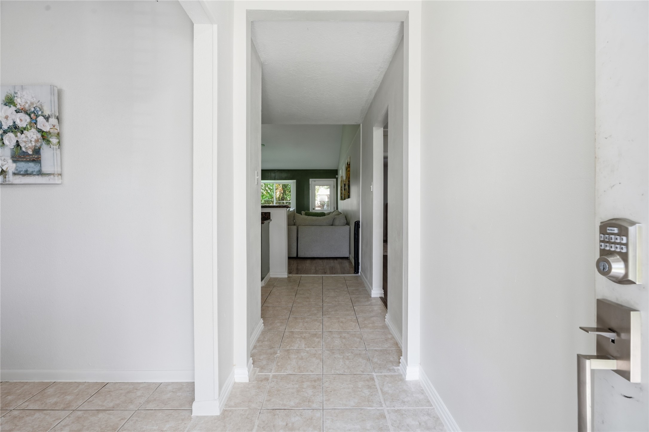 Welcoming entryway offering a clear view into the main living spaces with tile flooring and an open, functional layout. Welcoming entryway offering a clear view into the main living spaces with tile flooring and an open, functional layout.