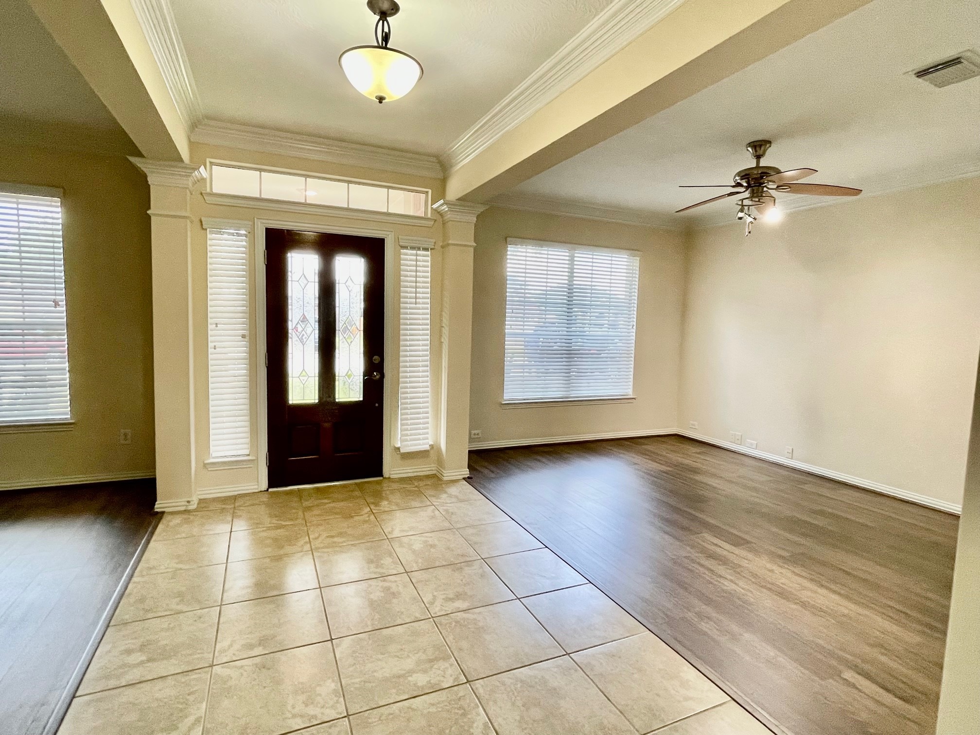 Beautiful foyer with formal living room and formal dining room.