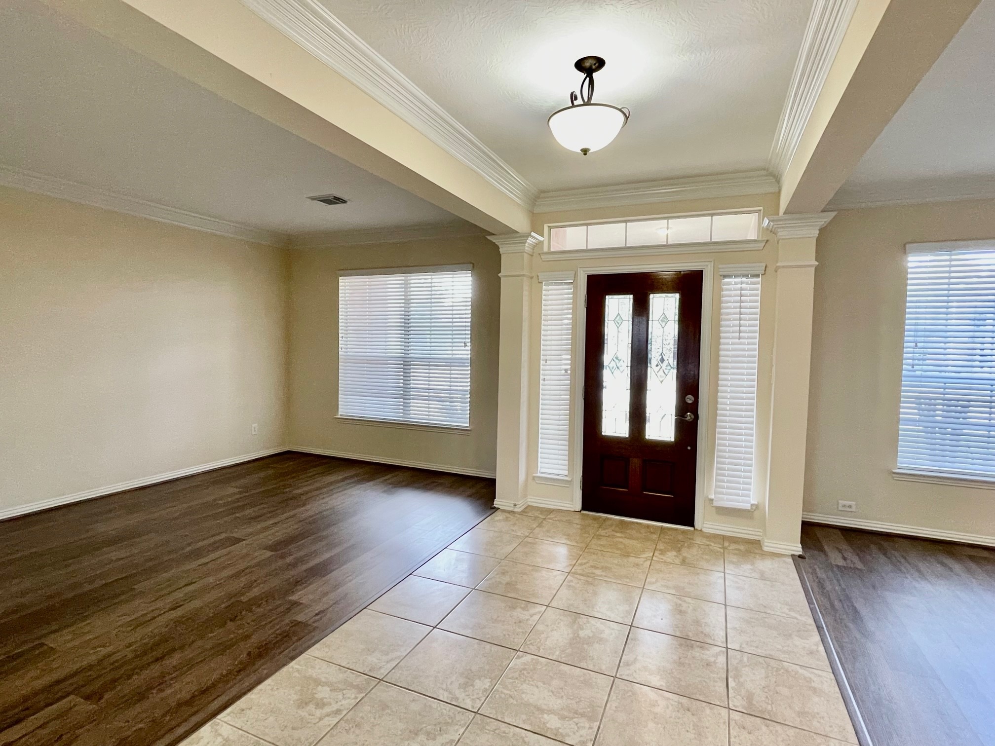 Entry Foyer with formal dining room and formal living room by right and left sides