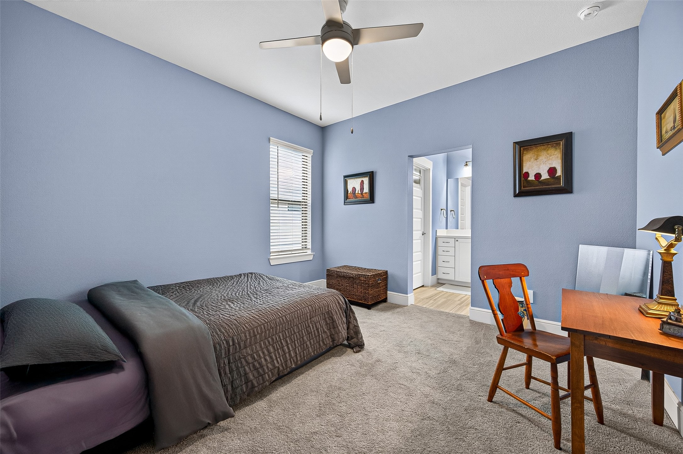 Bedroom #3. Spacious room could accommodate more seating or storage if needed.