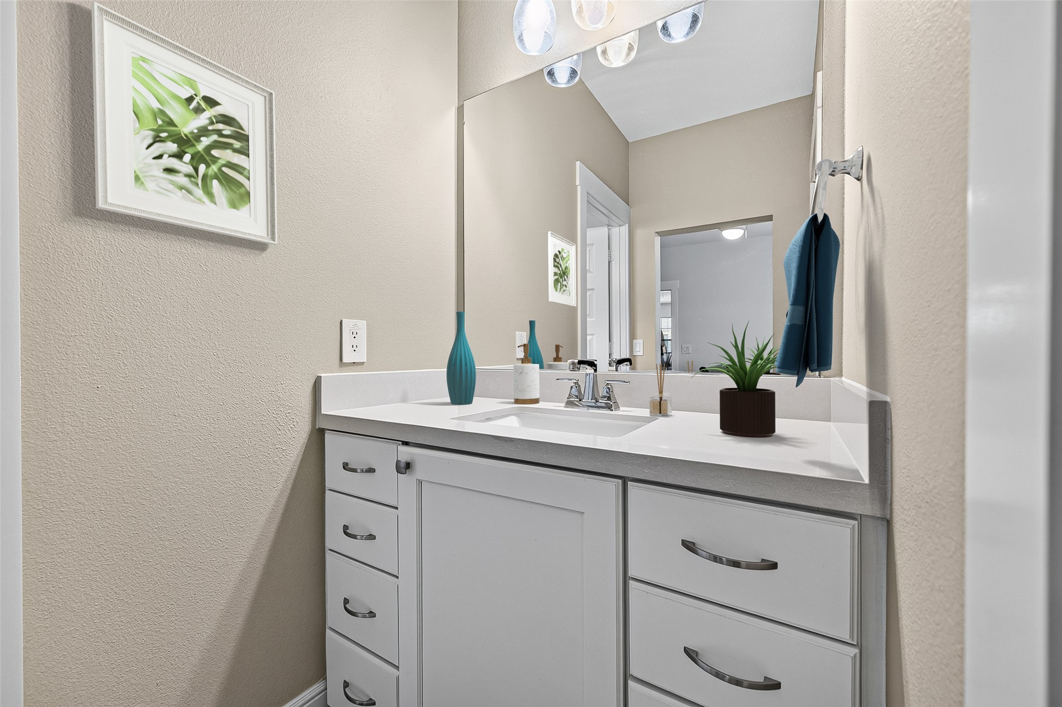 Private Vanity for 2nd Bedroom.  Virtually staged.  Ample storage.