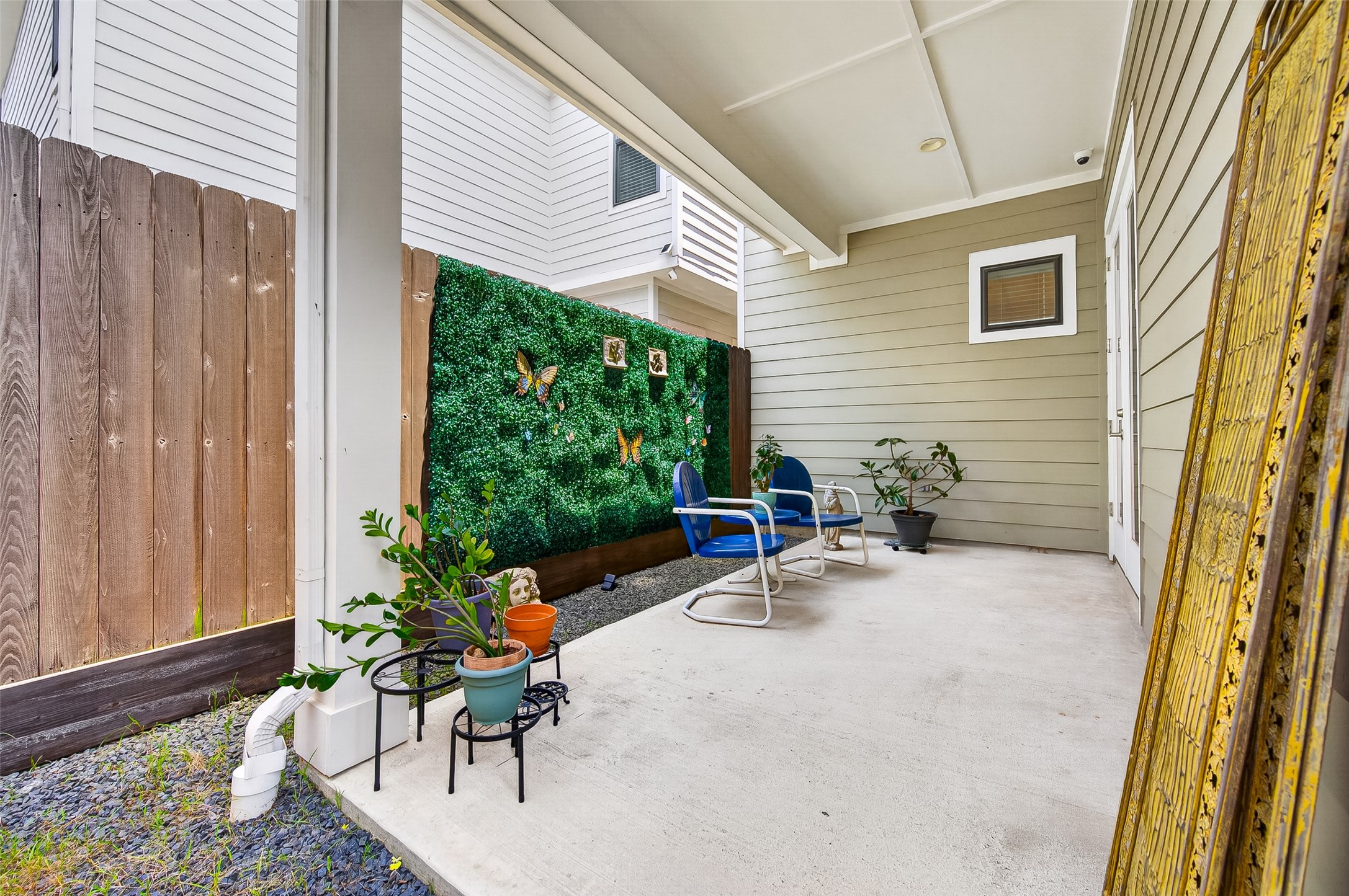 Enjoy your outdoor space "rain or shine" with this covered patio.  Plenty of room for more seating.