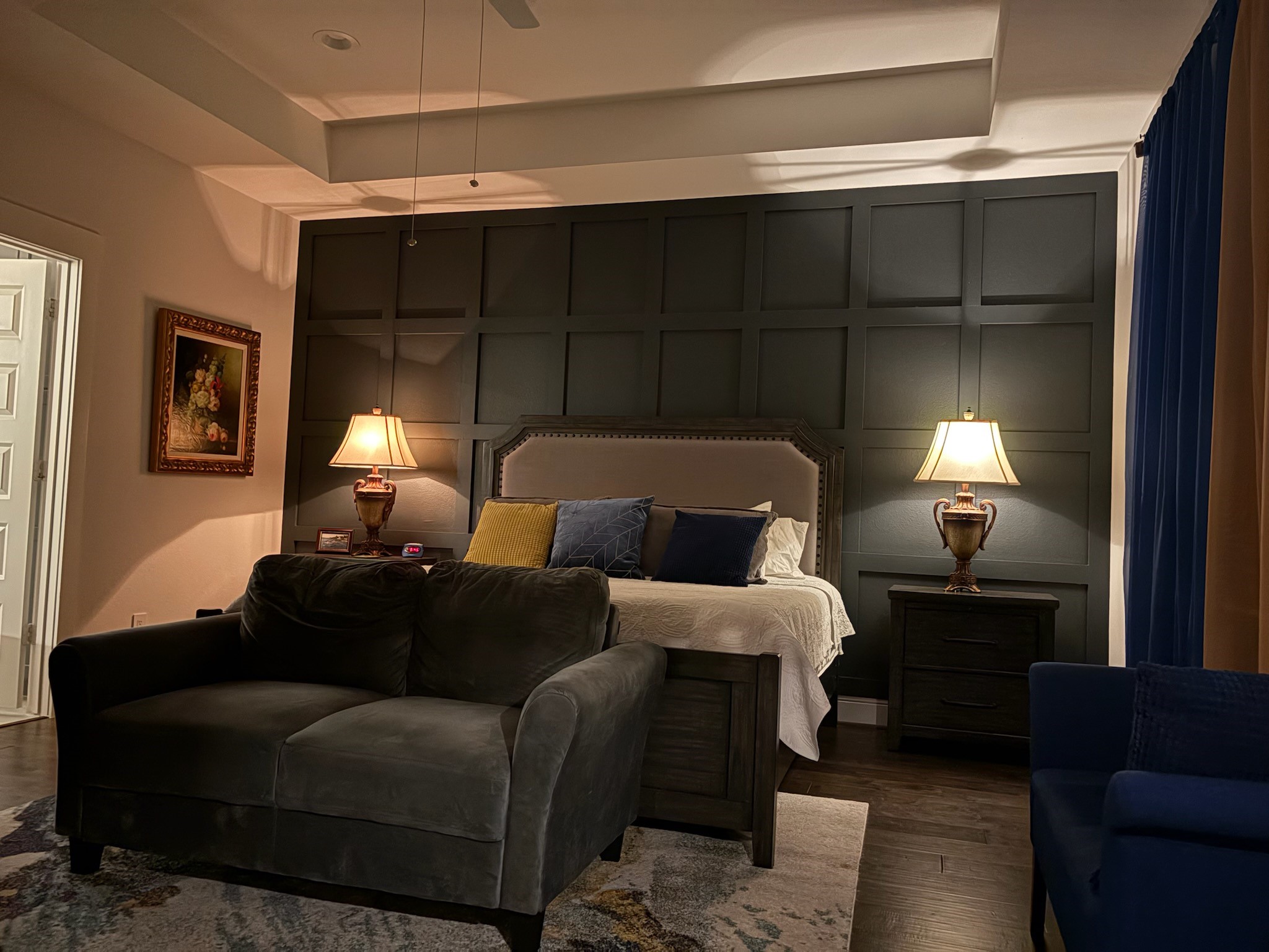 Comfortable Elegance!  The Primary Suite with dimmed lighting enhances the inviting and cozy look of this tranquil evening retreat.  A restful night's sleep should come easily here.