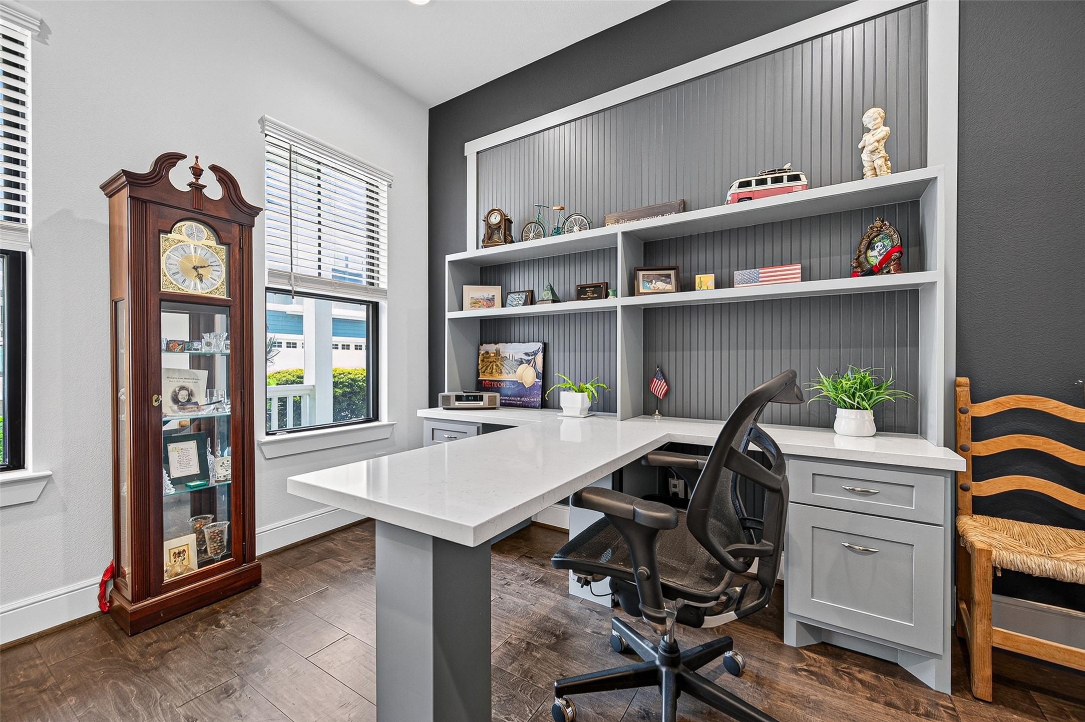 As you enter the home you see the Home Office/Study. Lots of natural light and ample workspace. The owner added custom shelving to maximize the functionality. As you enter the home you see the Home Office/Study. Lots of natural light and ample workspace. The owner added custom shelving to maximize the functionality.