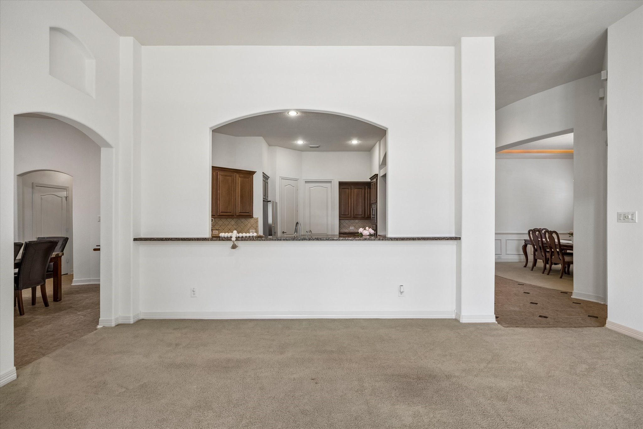 Kitchen opens into living area, great for hosting!