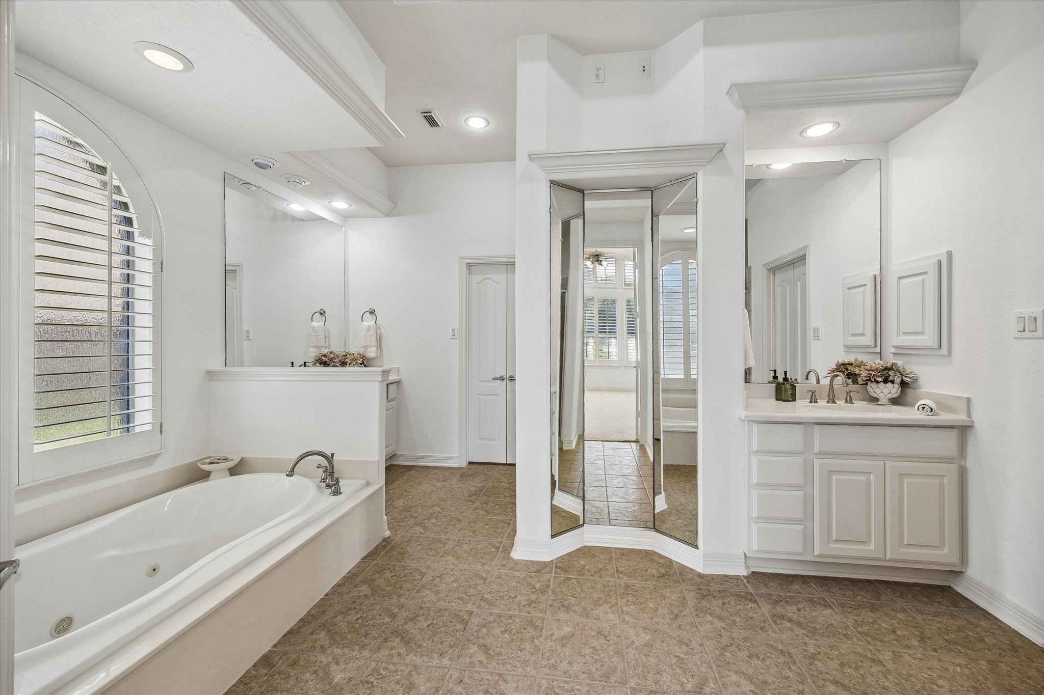 Beautiful Primary Bath equipped with double vanities.