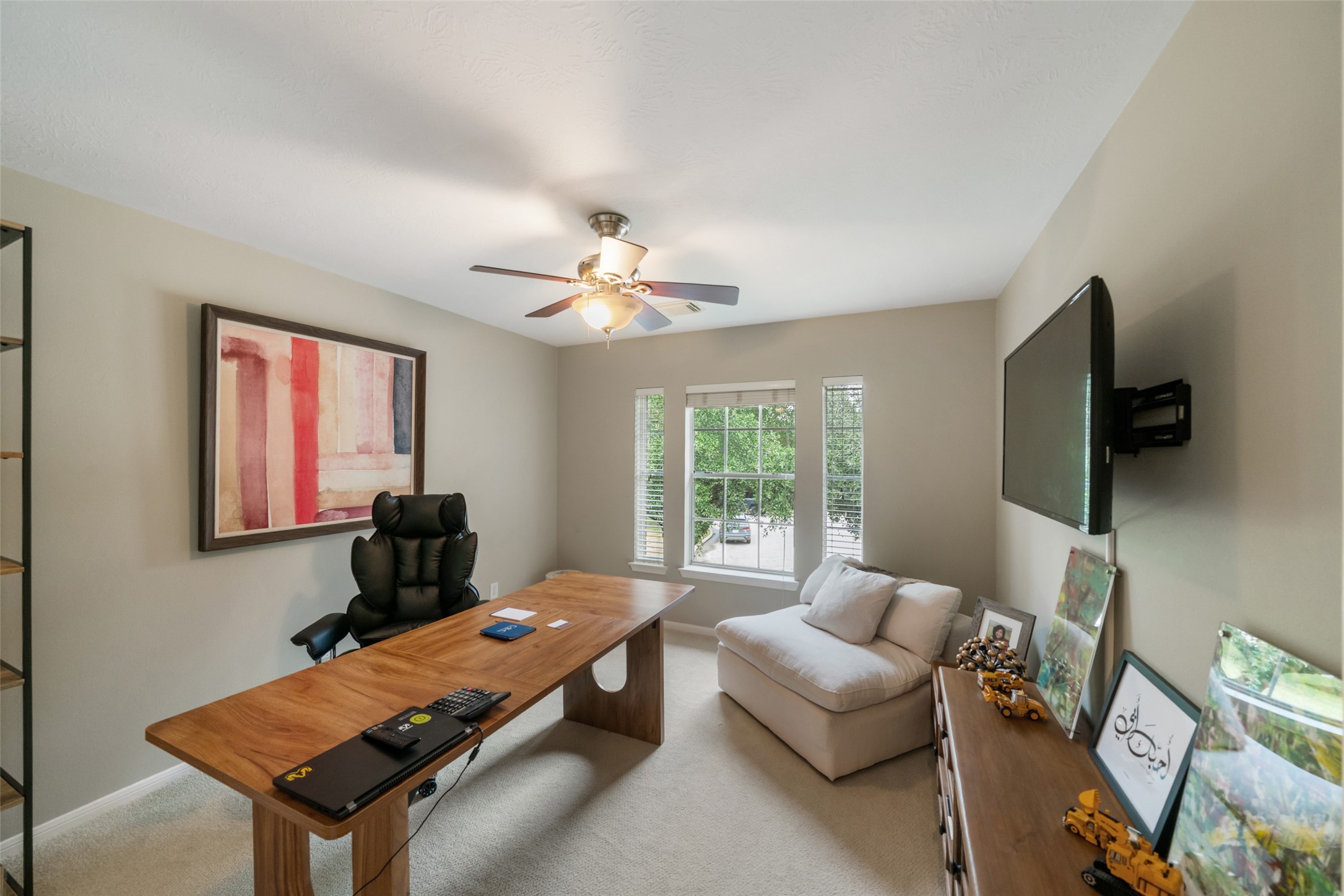 This is the 3rd bedroom currently used as another office.