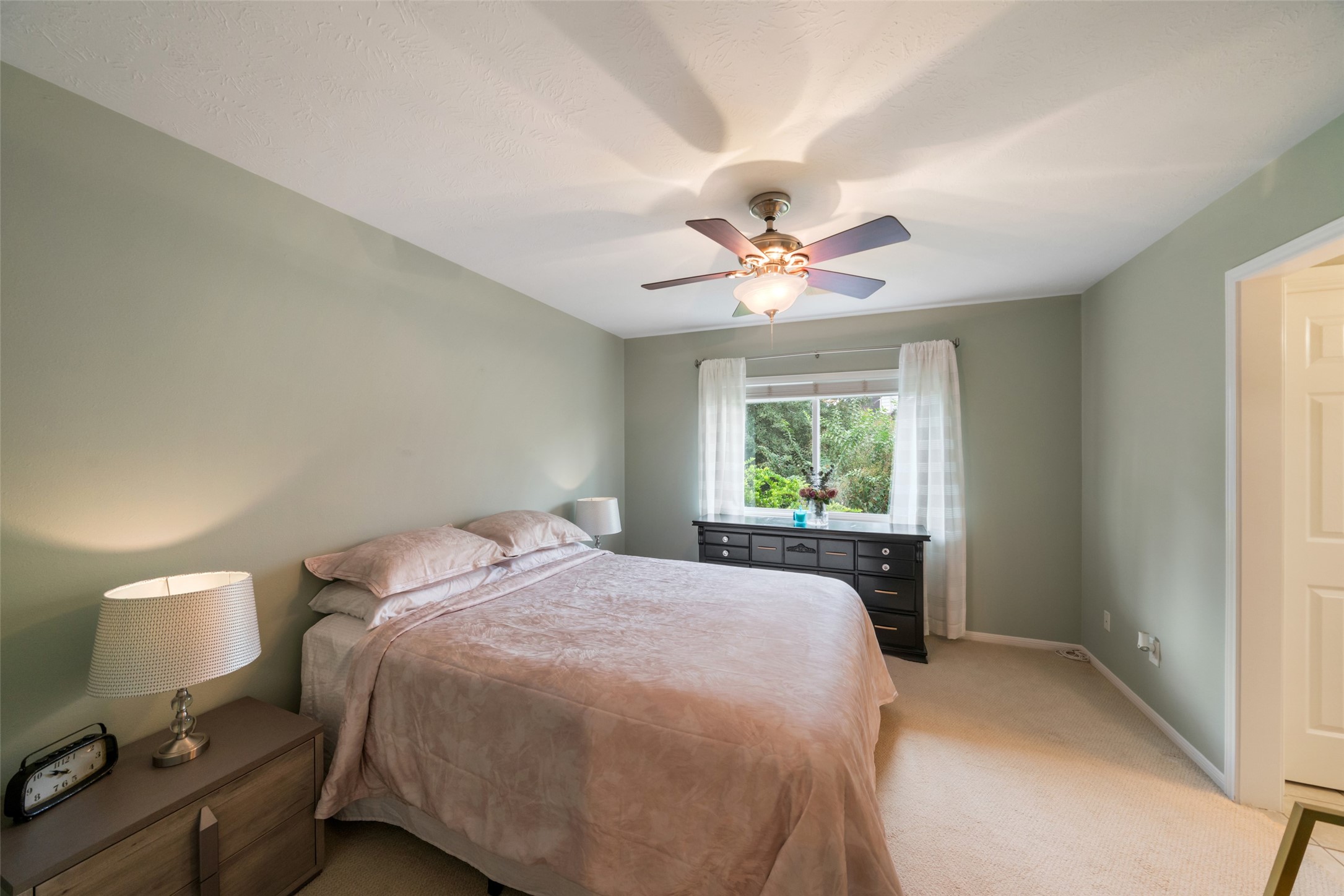 This bedroom is utilizing the Jack & Jill sink located for this room. All closets are walk in with shelves. Inviting neutrals are ready for your touch.
