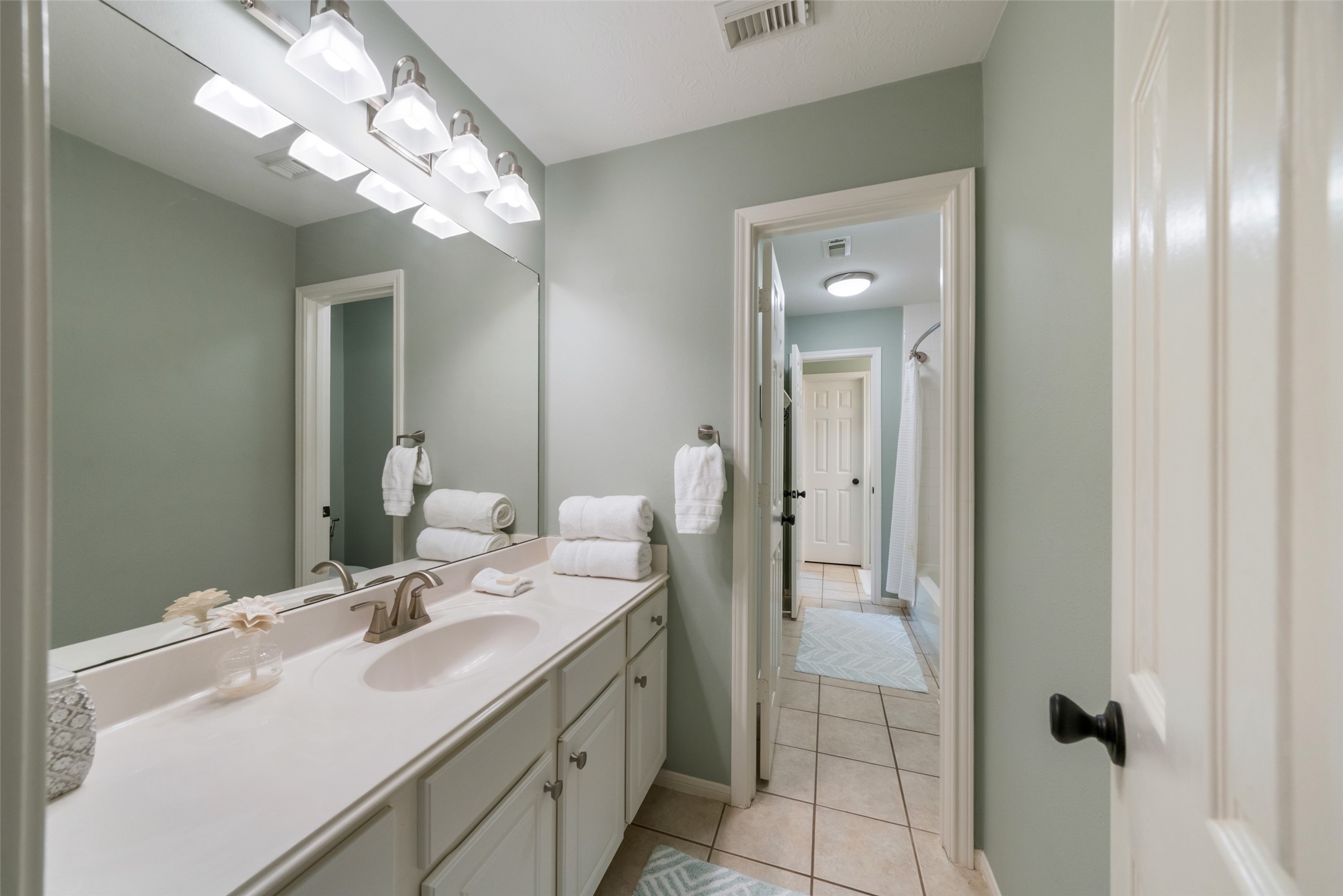 From the adjacent room. If you love a Jack & Jill this speaks to how user friendly this home is for everyone!