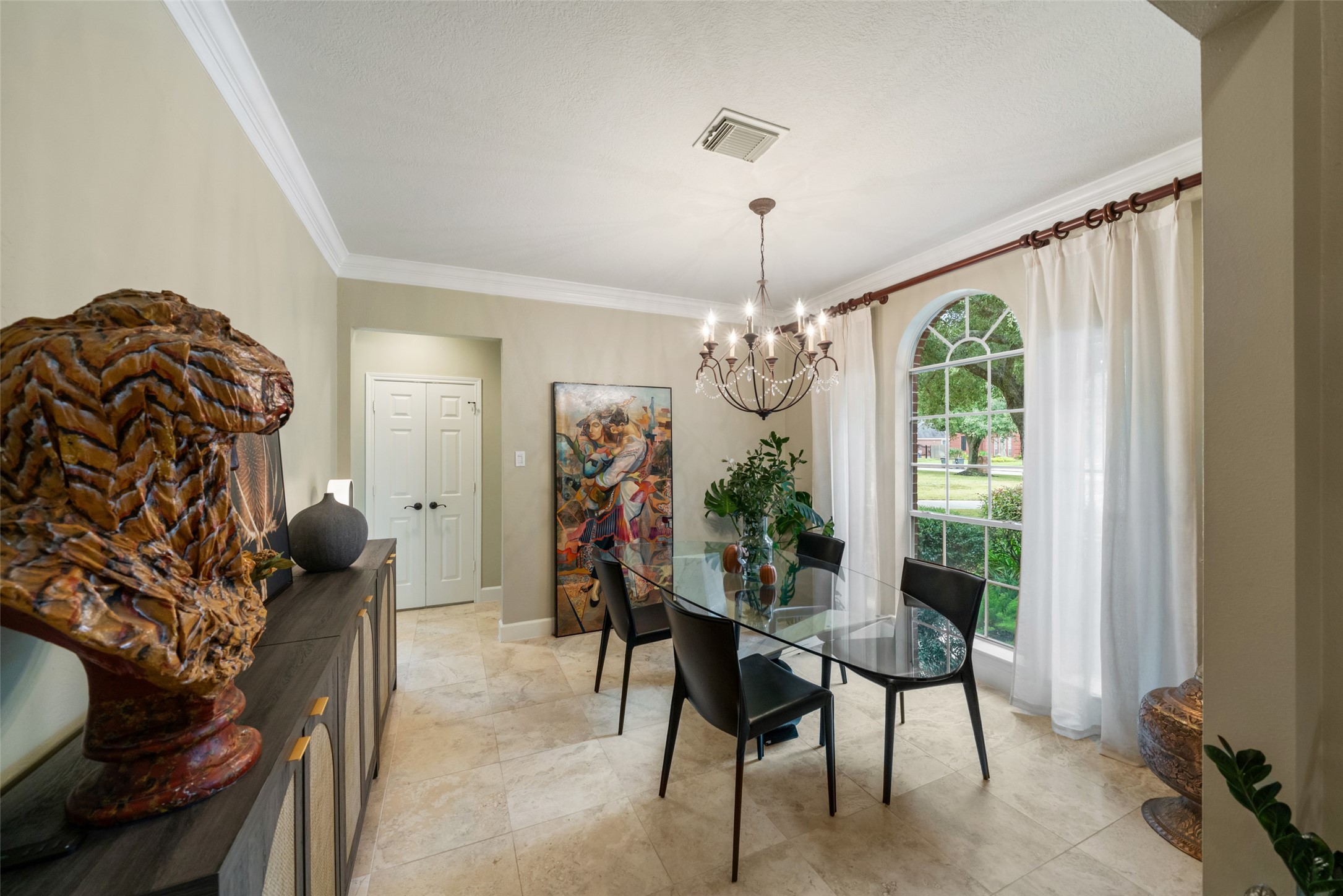 Formal dining room with window coverings included.