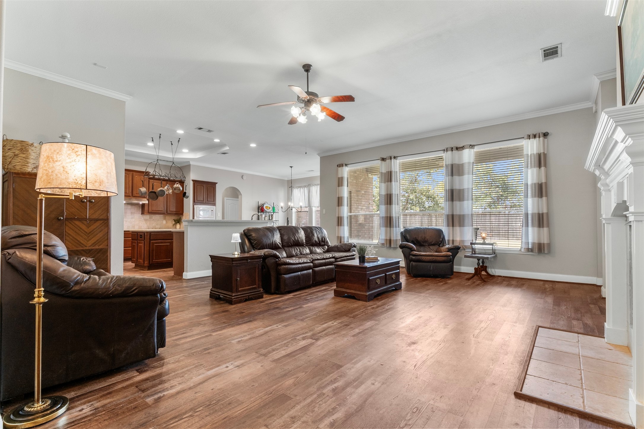 Beautiful wall of windows in this large living room.  This is a Coventry built home.