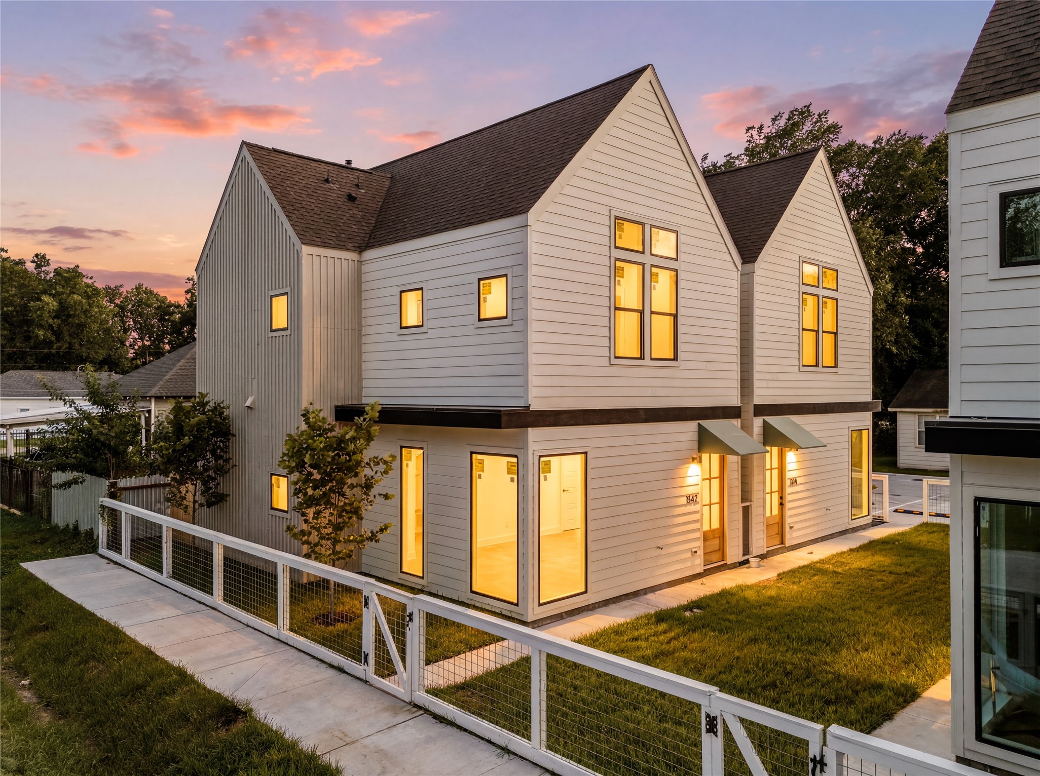 Contemporary dual-gable design with designated pedestrian paths. Contemporary dual-gable design with designated pedestrian paths.
